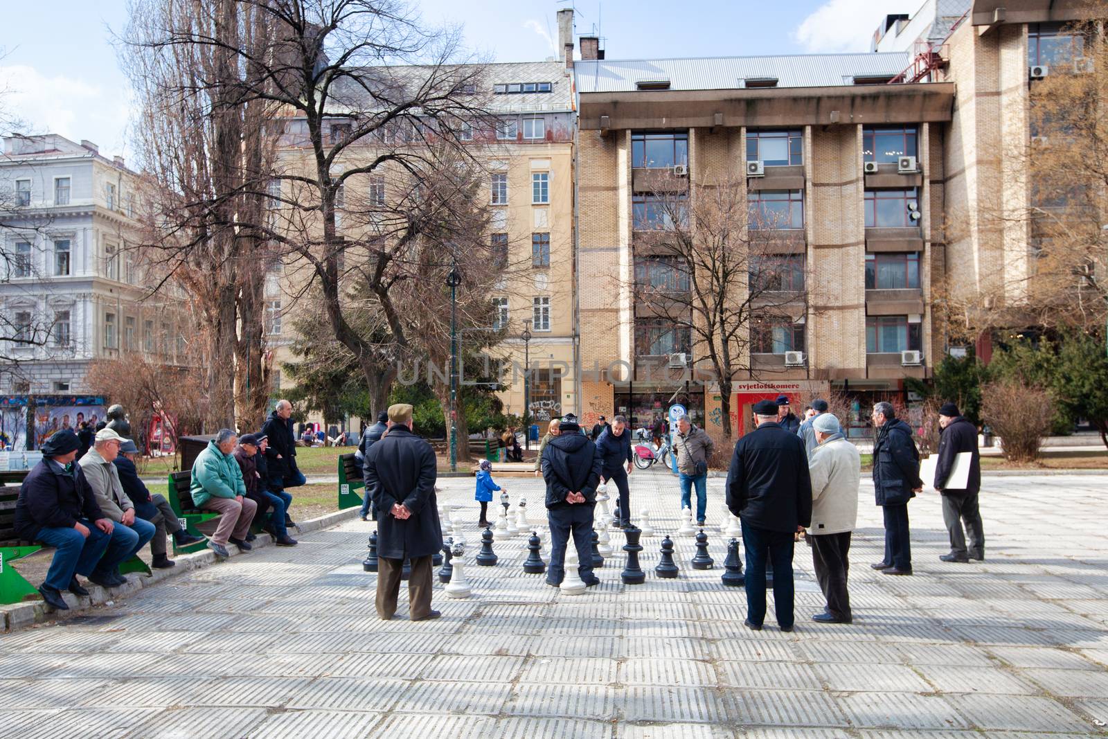 Sarajevo, Bosnia and Herzegovina - 27 February: people playing giant chess on a square in Sarajevo