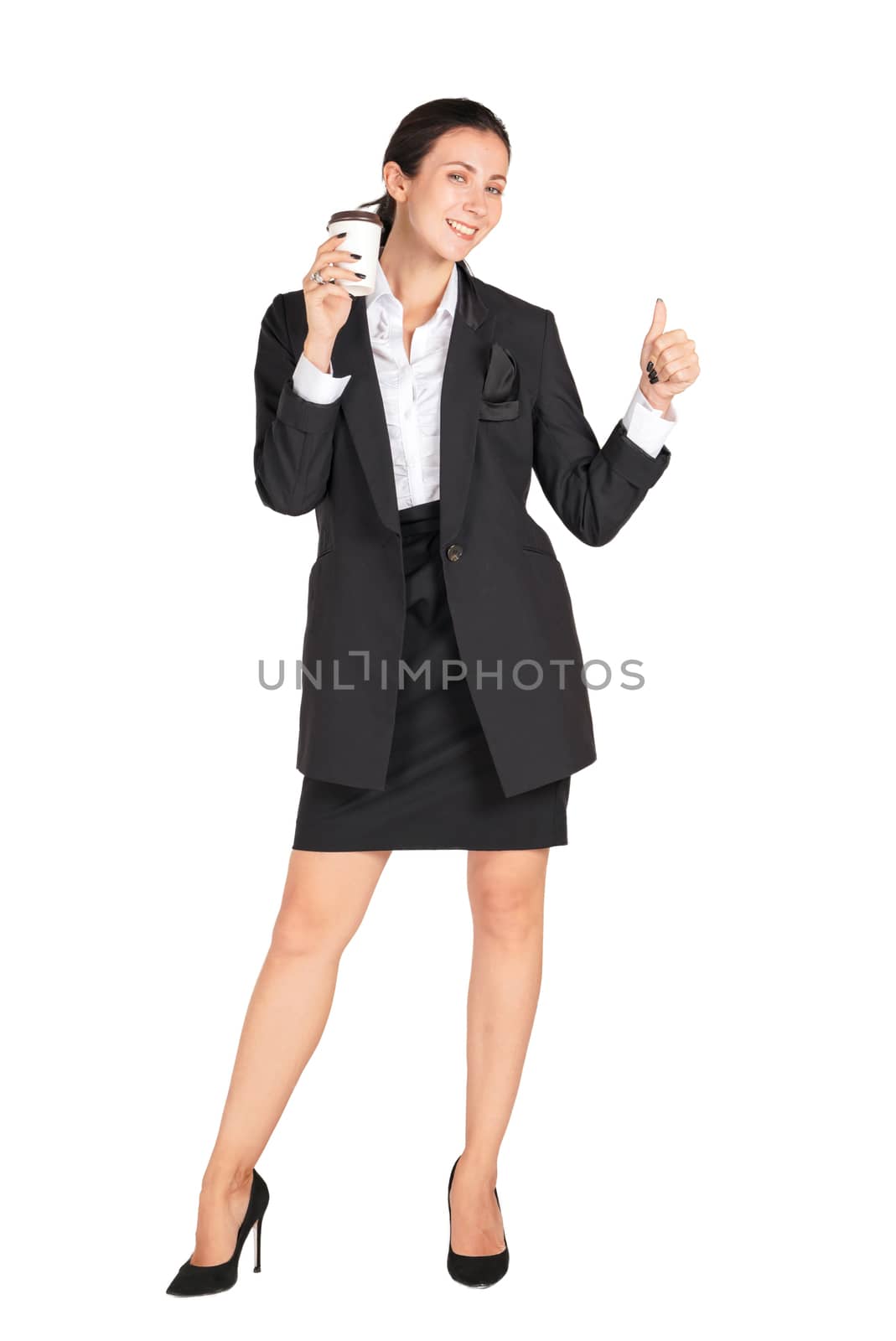 Young women in black suit with a smile holding a cup of coffee. Portrait on white background with studio light.