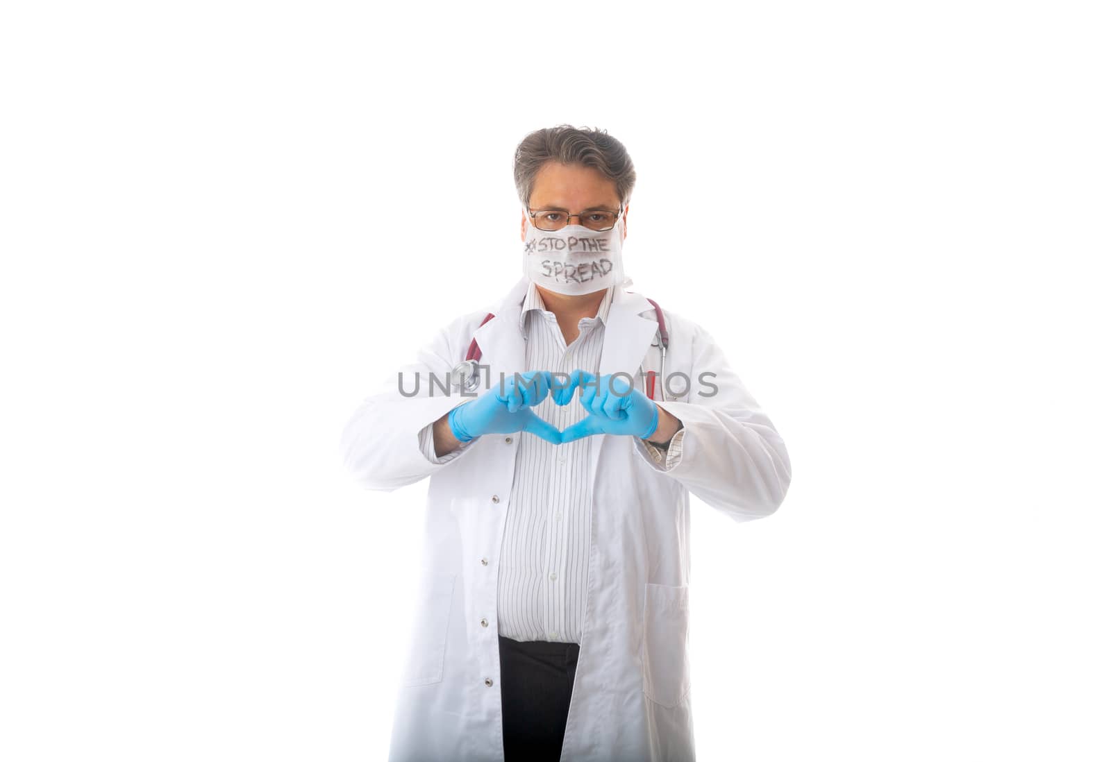 Doctors gloved hands make a heart symbol sign of thanks or compassion during COVID-19 coronavirus pandemic