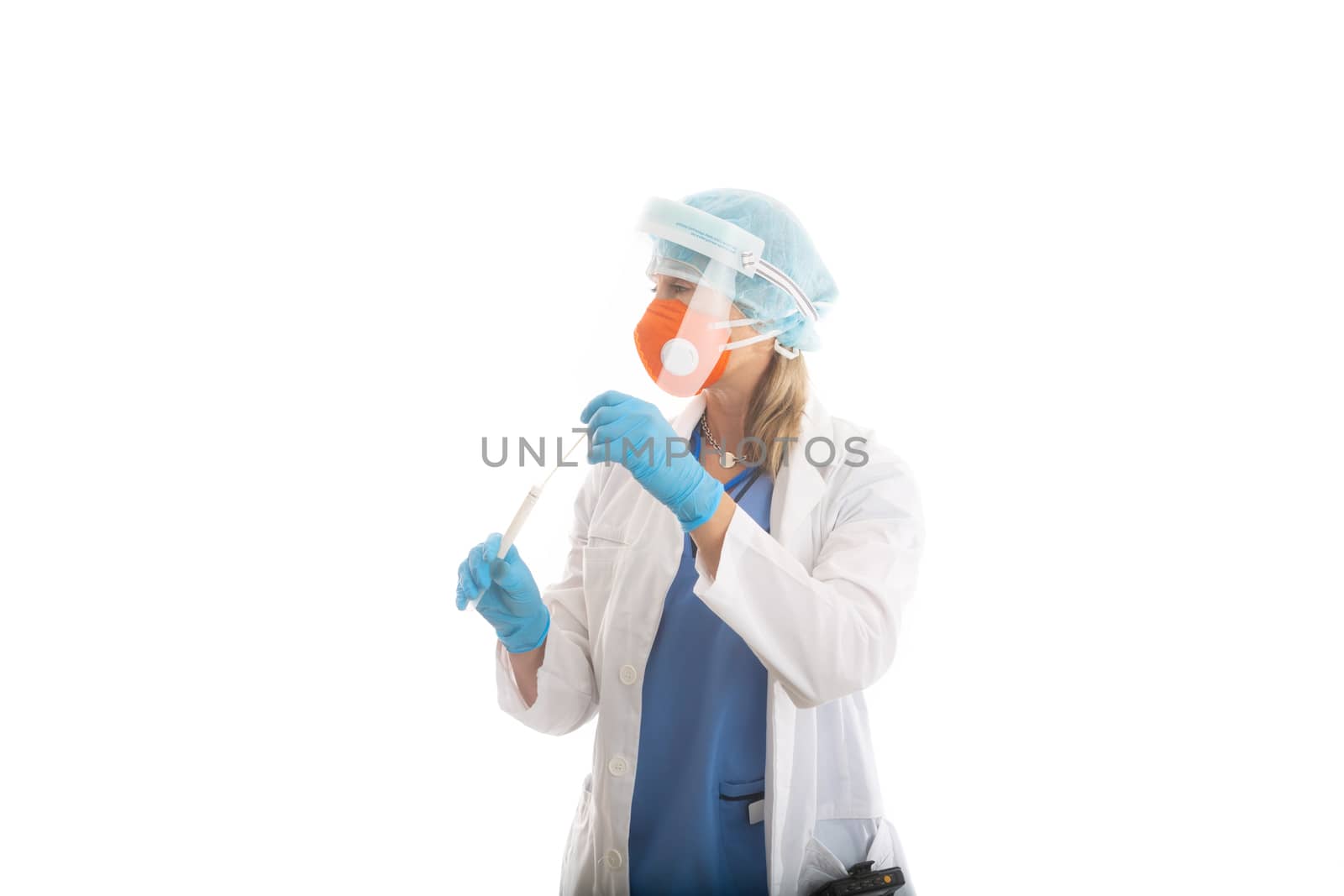 Doctor nurse or pathologist in full PPE P2 respirator mask and face shield holding a nose throat swab for COVID-19  or flu virus.  She is looking sideways for your message