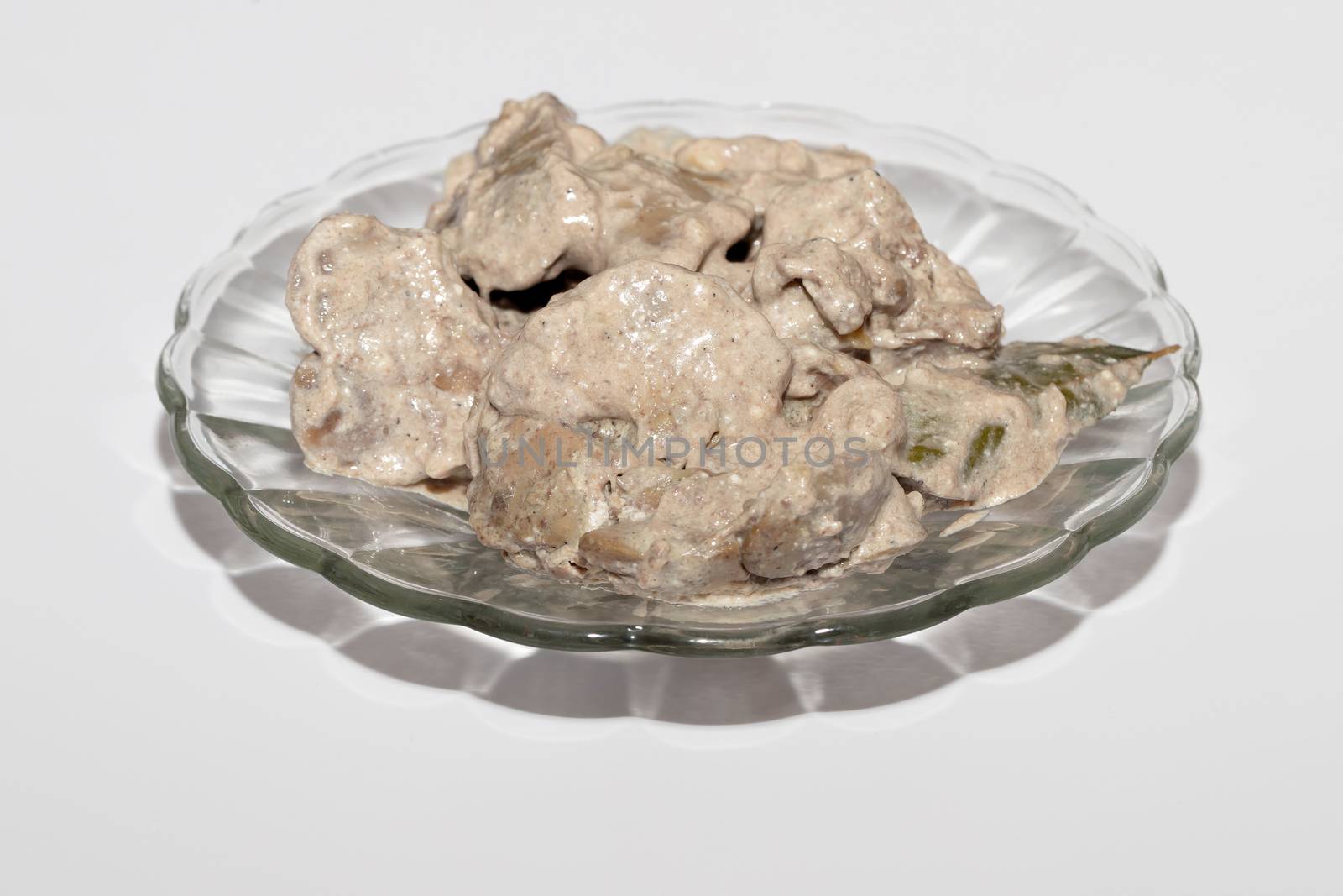 Liver cream stew, chicken liver in sour cream sauce, healthy food, menu concept background. Top view, close-up