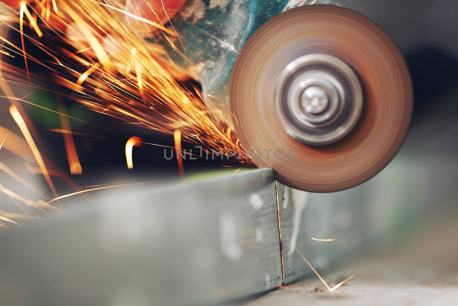 metal sawing close up sparks spray