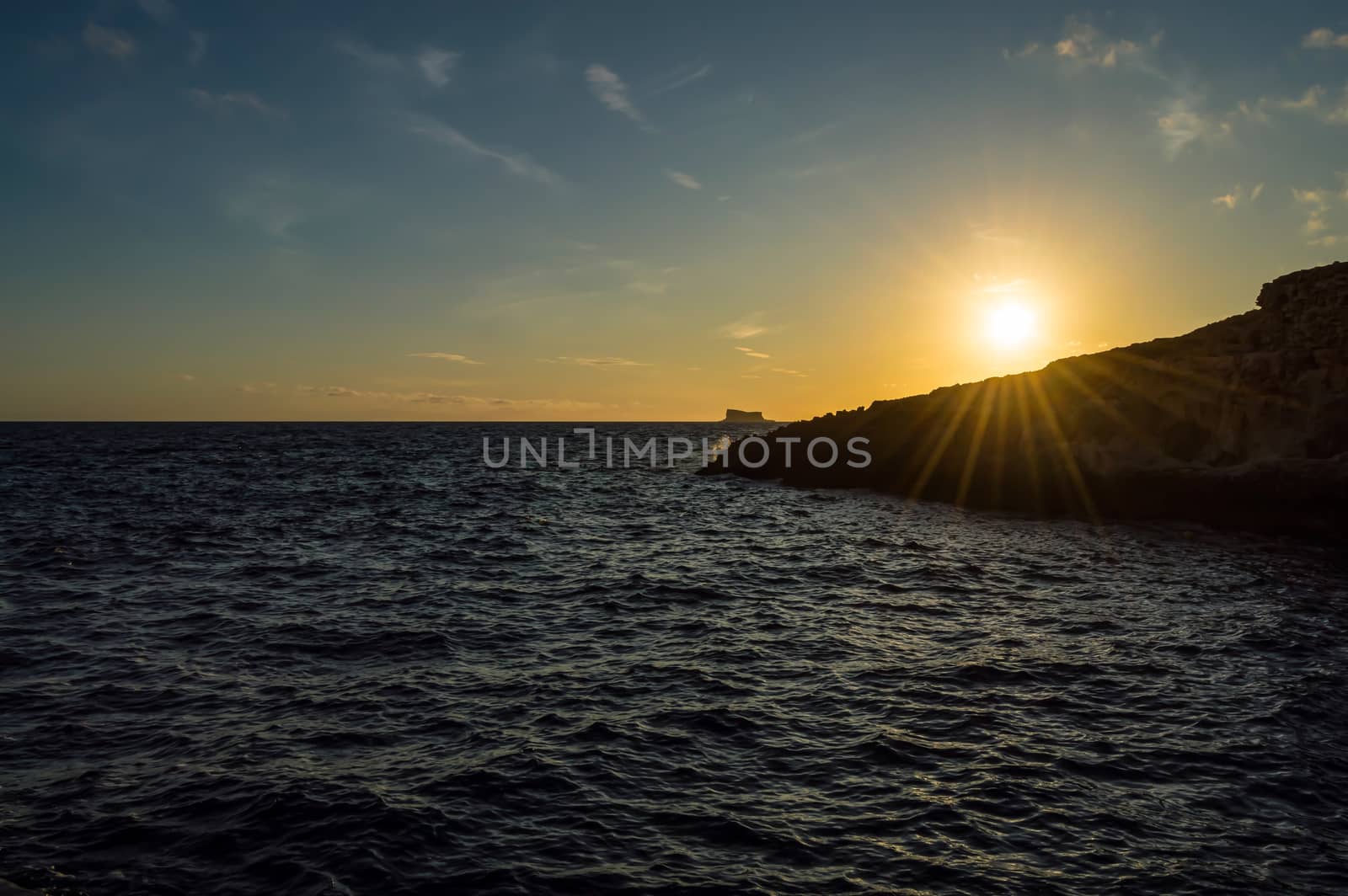 Sunset over the Mediterranean Sea viewed from the Island of Malta