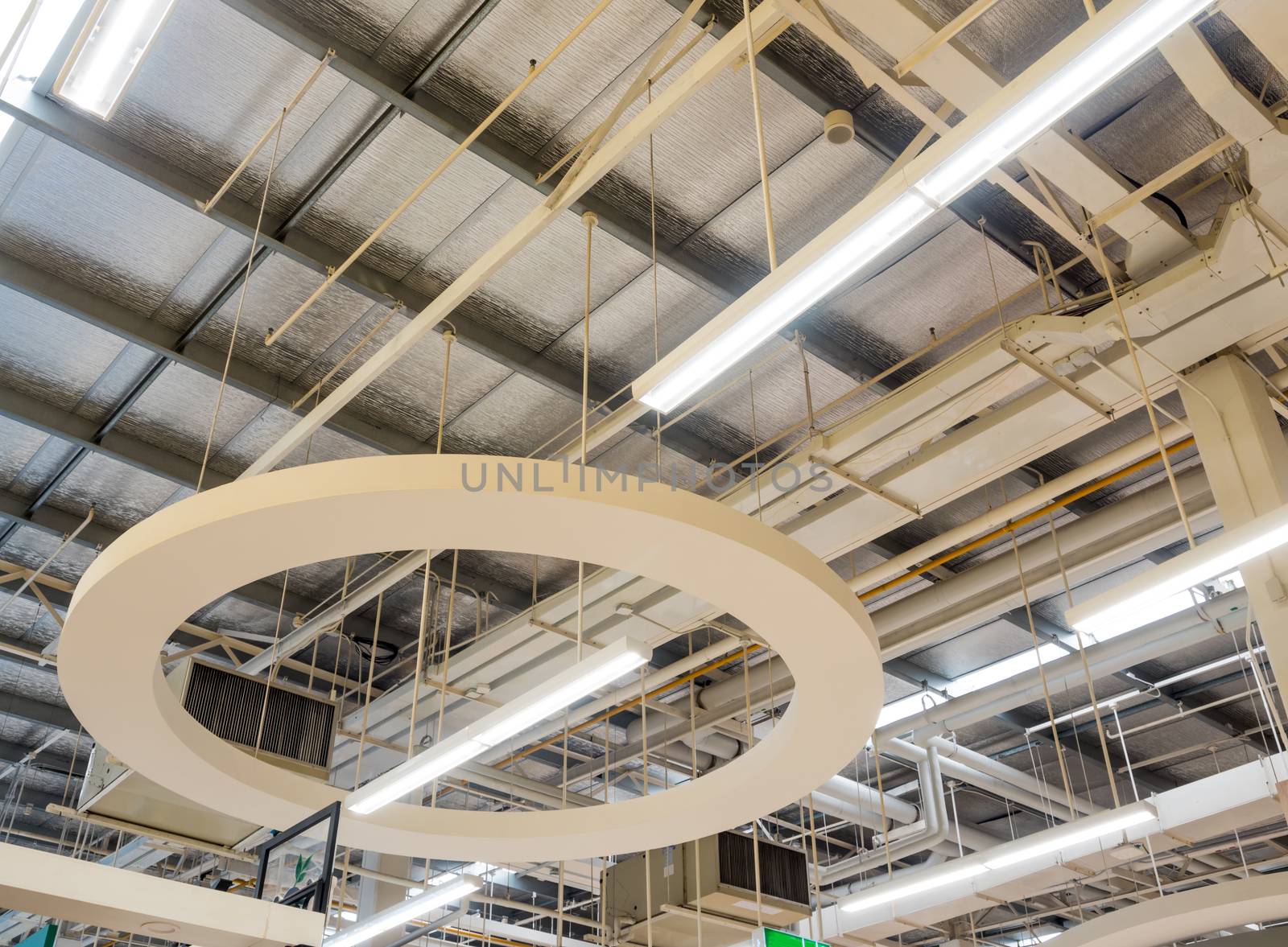 Ceiling mounted Lamps pipes and air ducts and communication system in the hall