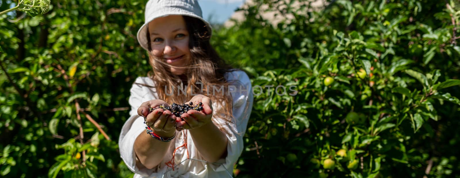 hands holding fresh berries in nature