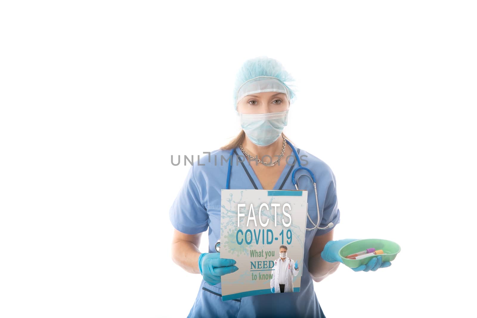 A nurse, pathologist or hospital worker holds a fact brochure and kidnes dish with blood tubes during the COVID-19 influenza coronabirus pandemic