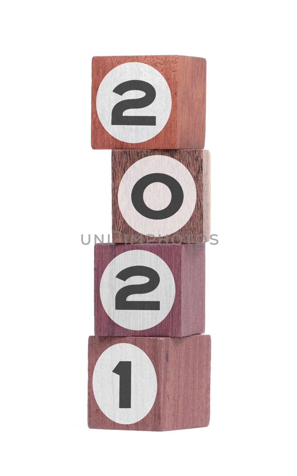 Four isolated hardwood toy blocks on white, saying 2021