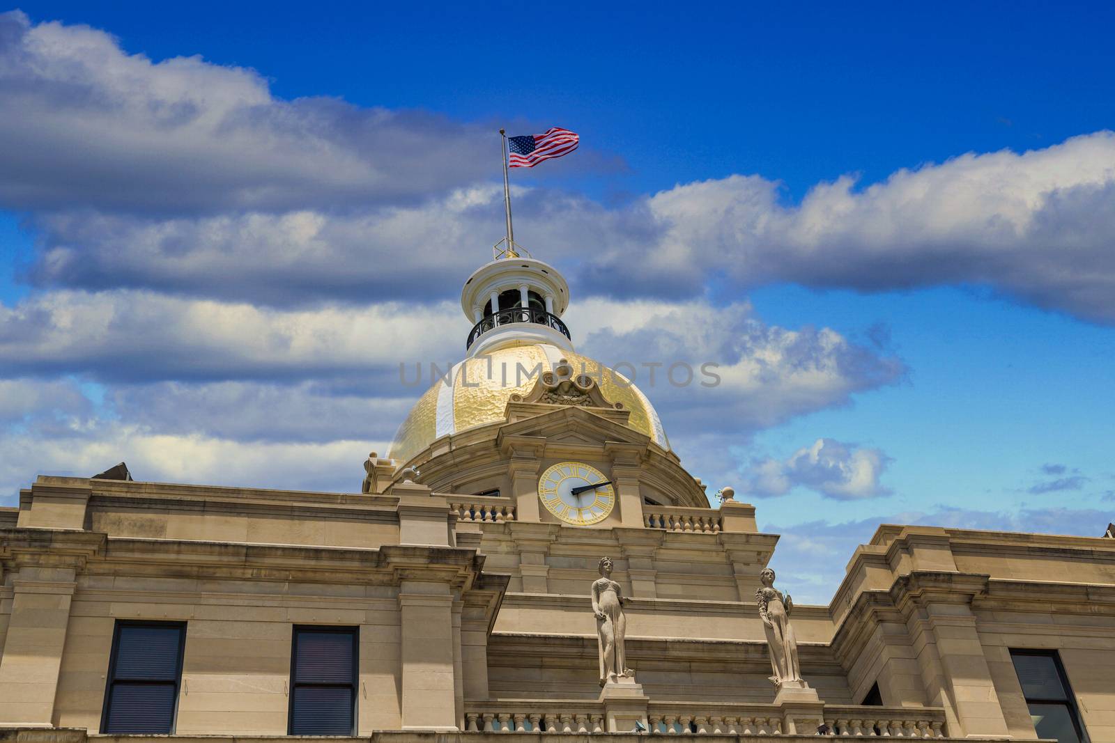 Classic old Savannah, Georgia City Hall with Gold Dome and American Flag