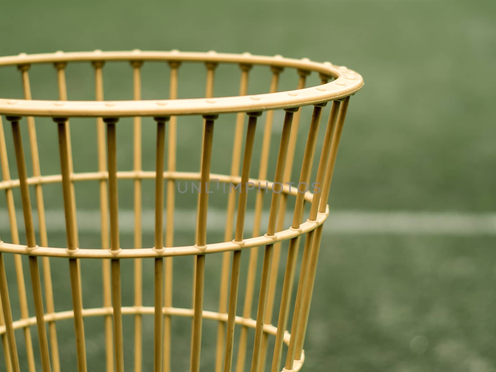 The basket of chairball game beside the field