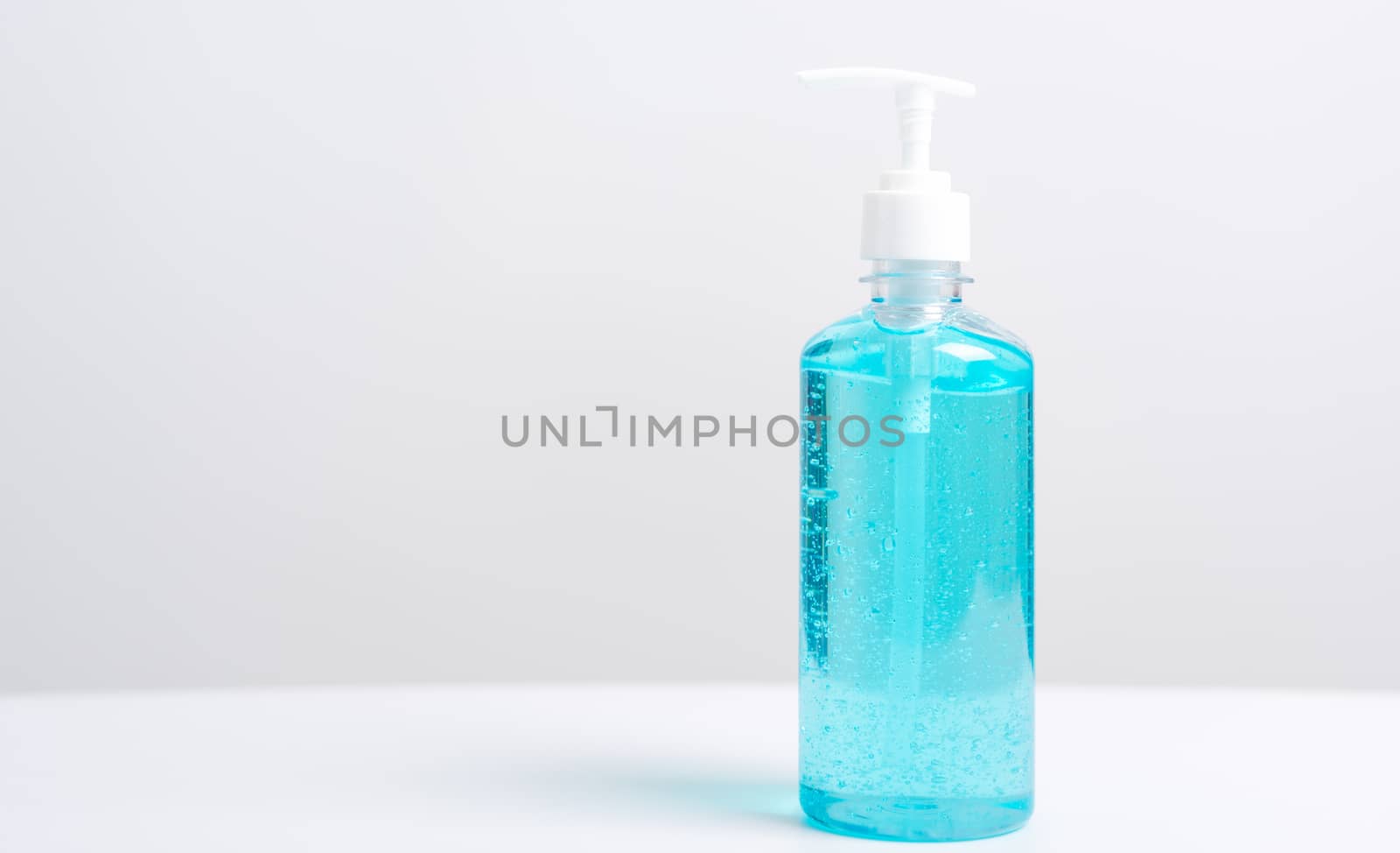 Plastic dispenser sanitizer alcohol gel pump bottle for washing hand hygiene prevention of coronavirus virus studio shot on white background