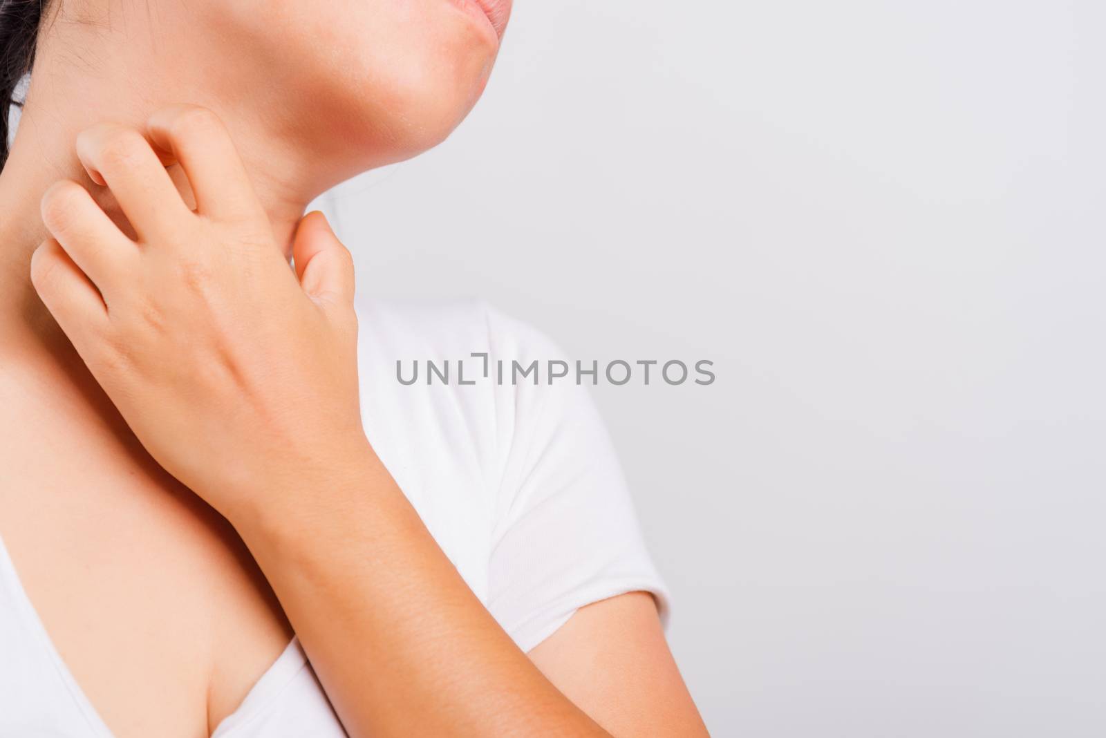 Asian beautiful woman itching her useing hand scratch itch neck on white background with copy space, Medical and Healthcare concept