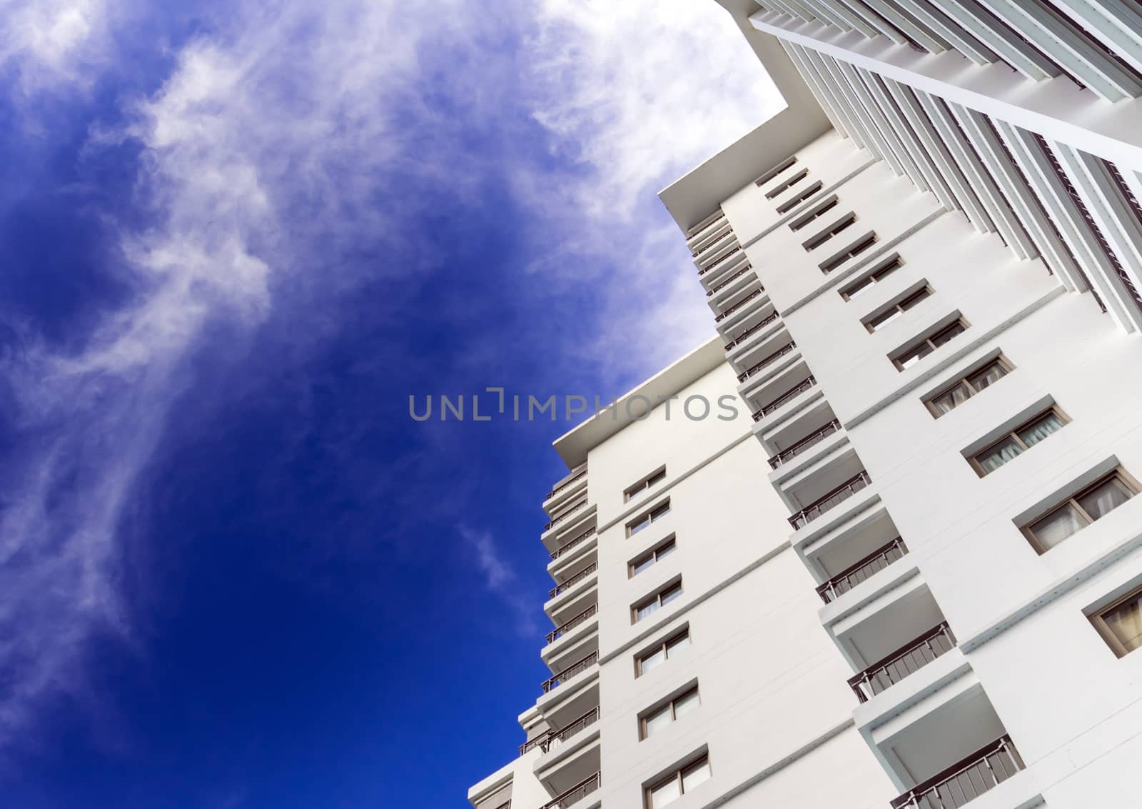 High-rise building and bright blue sky