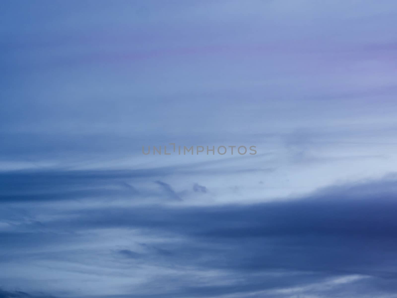 Gray fluffy clouds in the morning sky with sunlight by Satakorn