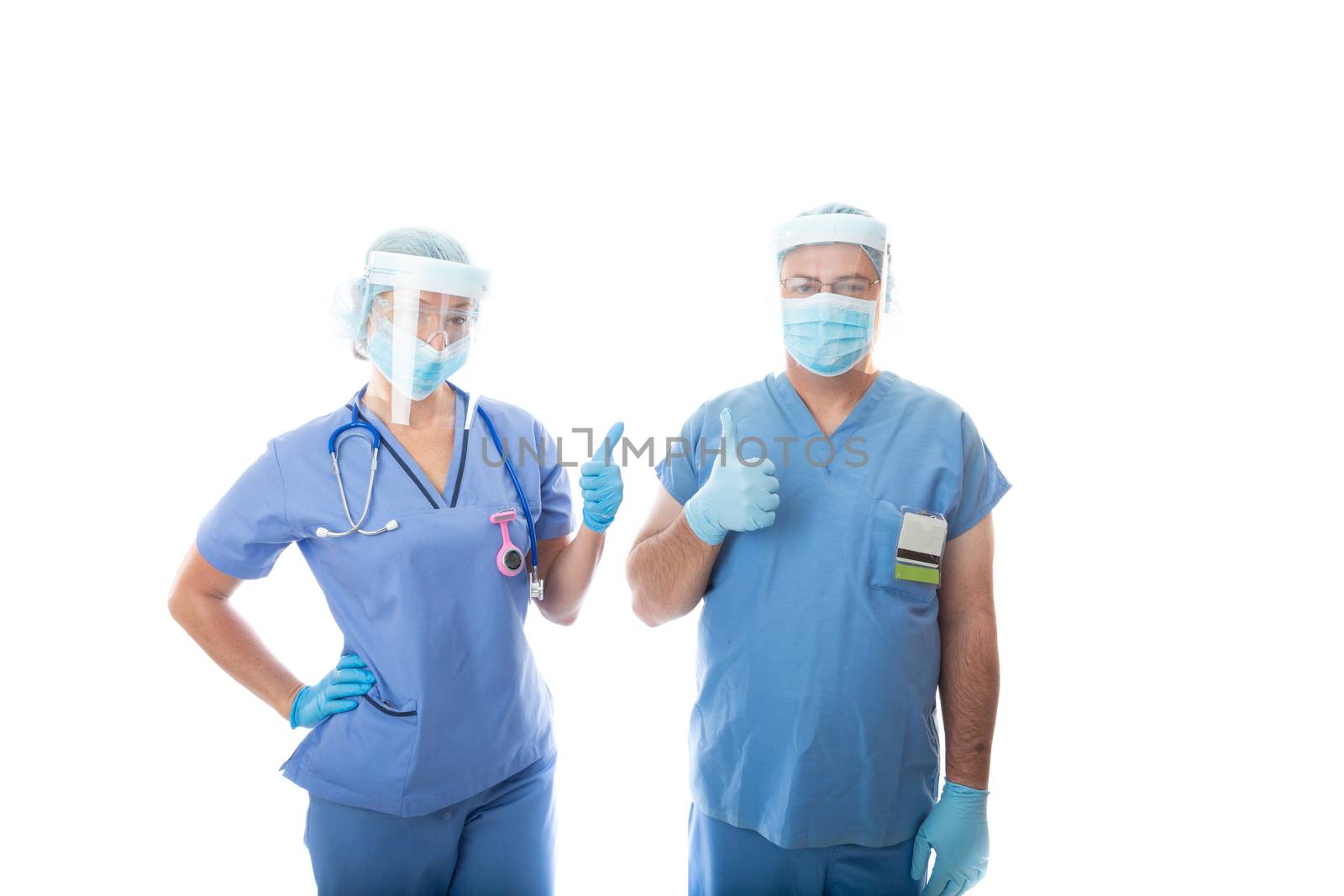 Two critical care nurses give a thumbs up gesture by lovleah