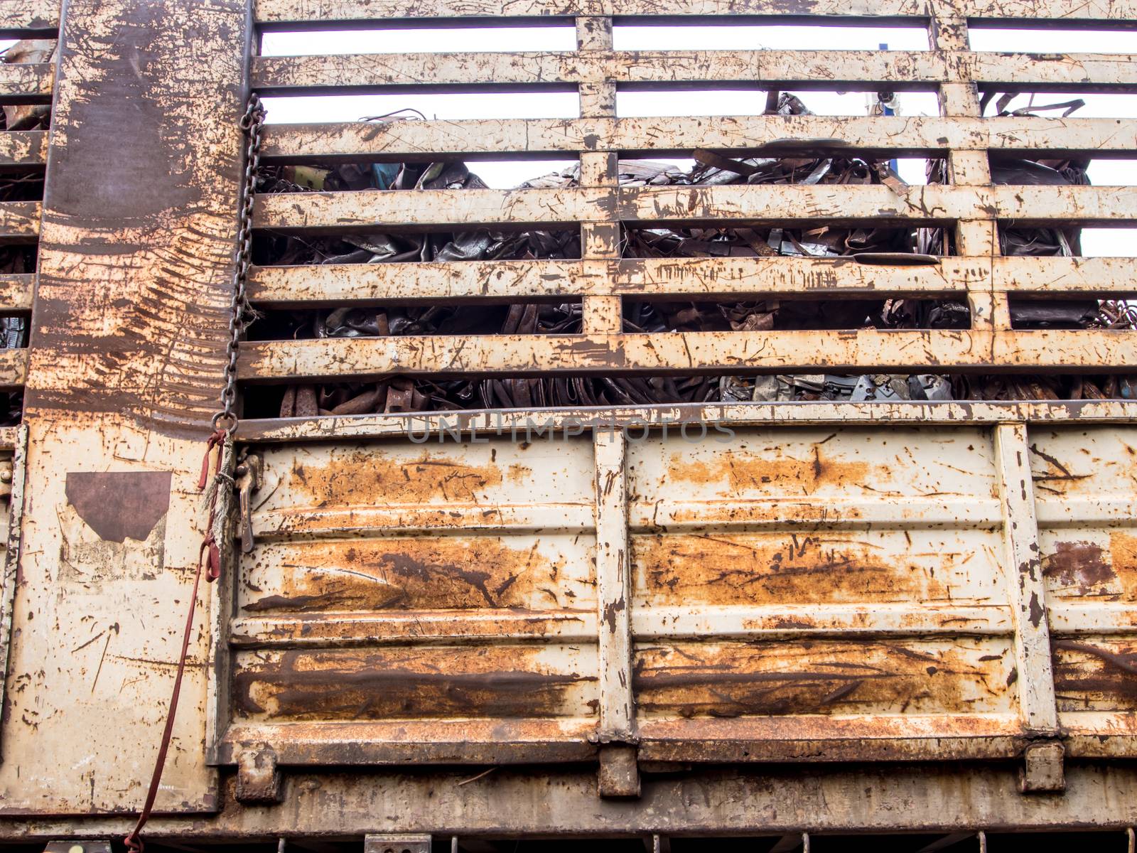 Scrap steel in the old steel crate in the truck by Satakorn