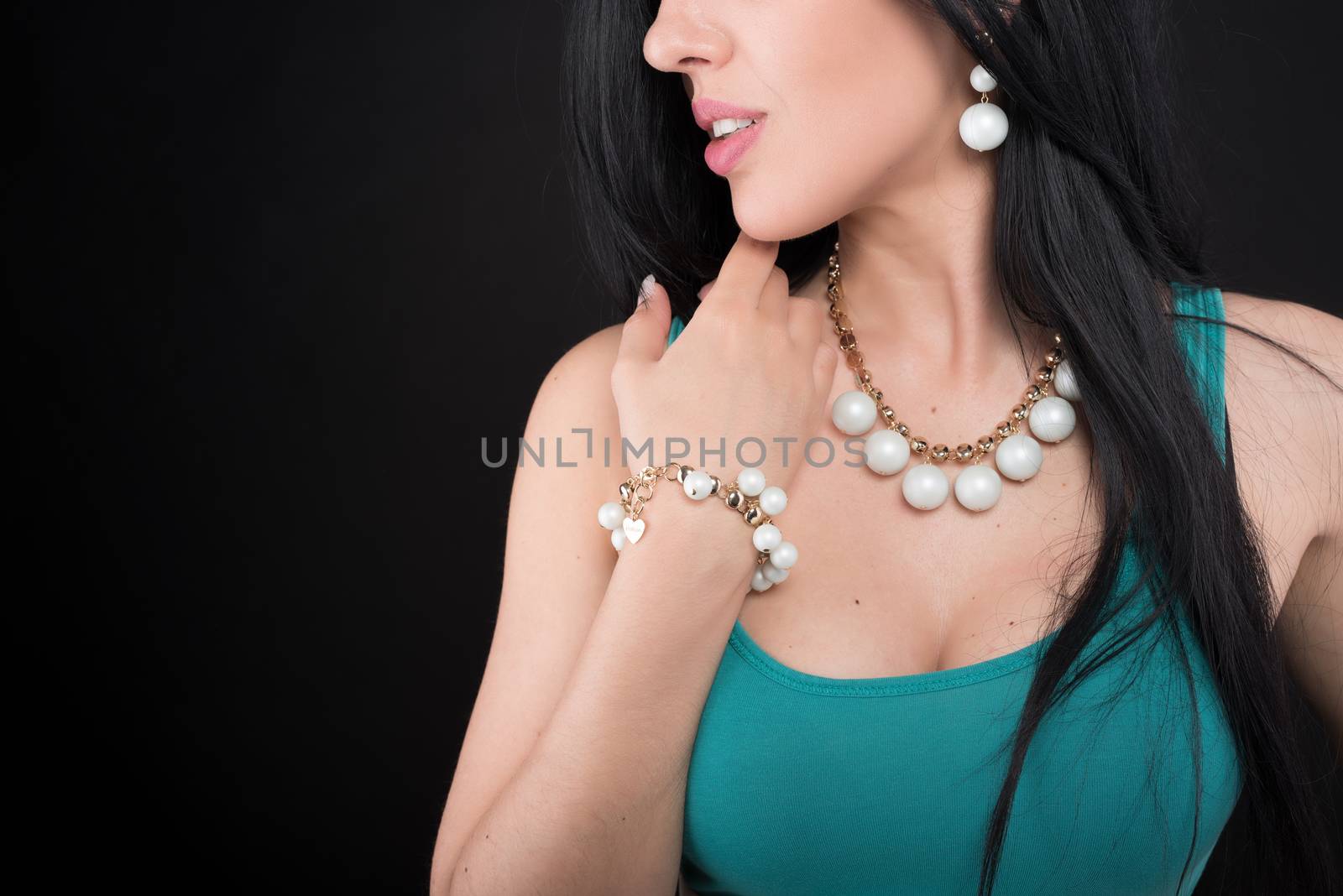 Young woman with beautiful jewelry on black background, closeup by lussoadv