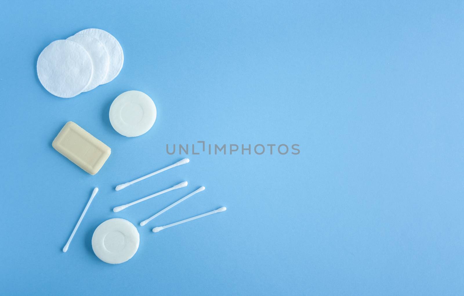 Composition of soap, cotton swabs and cotton pads  by Quils