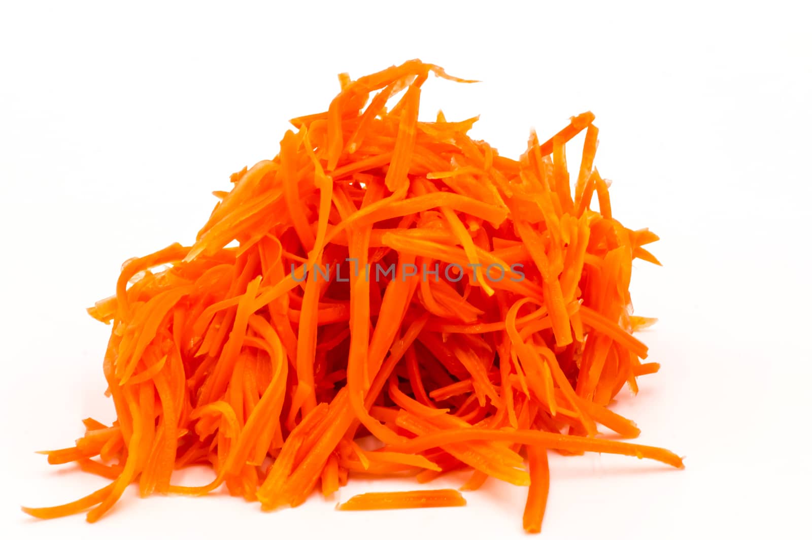 A bunch of grated carrots close-up  by Philou1000