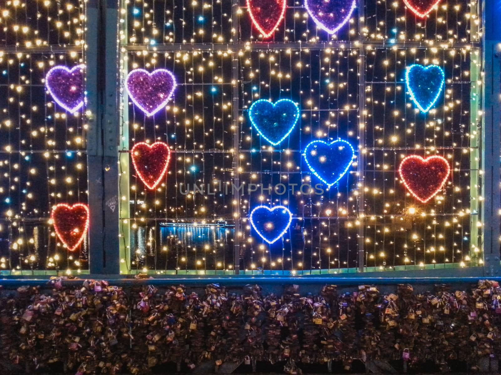 Colorful love decorations at christmas night on bridge in Wroclaw by Wierzchu