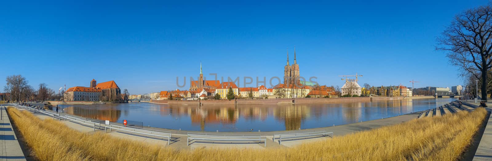 Panorama of Wroclaw city over the river at sunny no clouds day