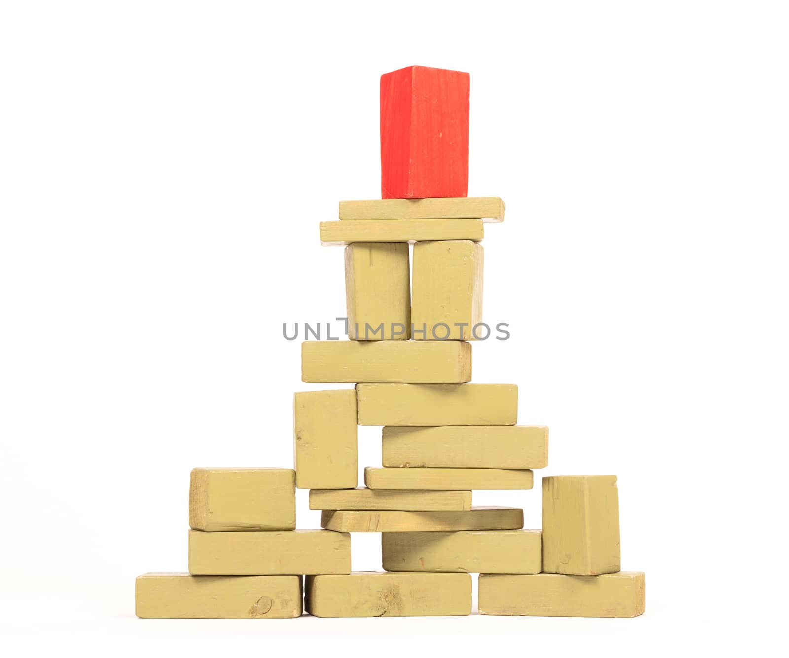 Vintage green building blocks isolated on white background, one standing out