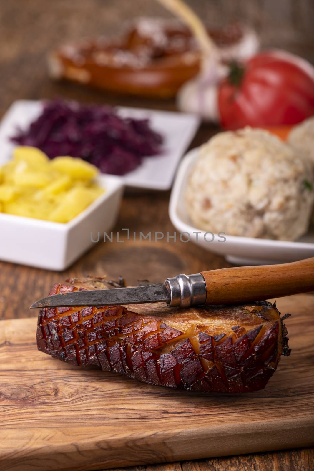 portion of fresh roasted pork on a blue plate