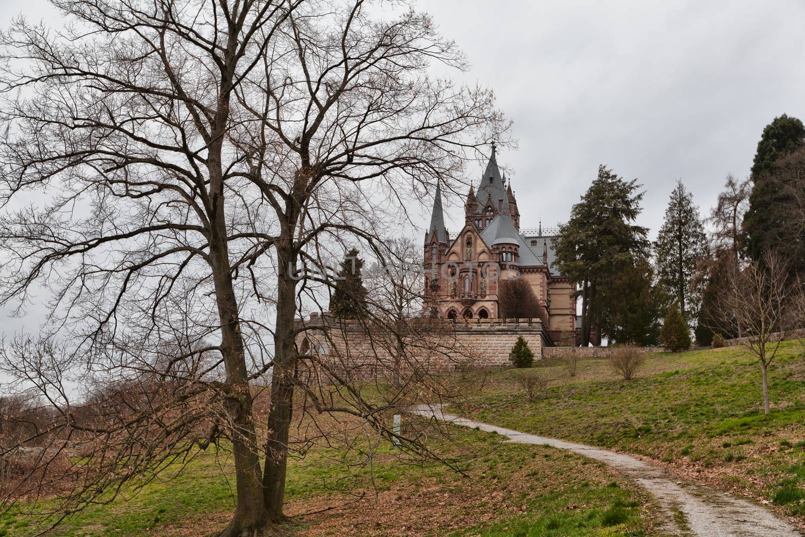 Konigswinter, Germany - 2 March 2019: Drachenburg castle on a gloomy day
