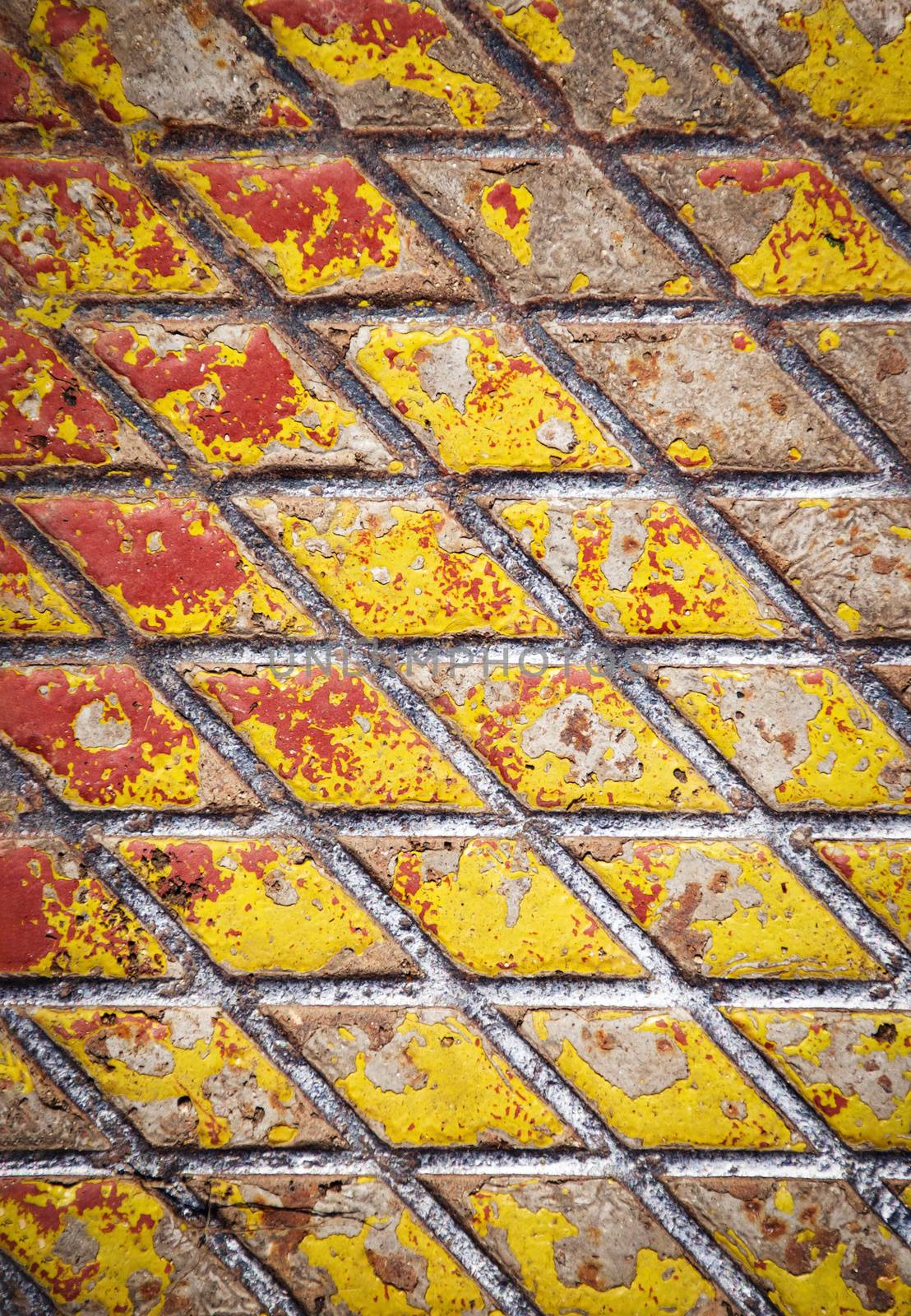 abstract background or texture Detail of a yellow painted iron hatch