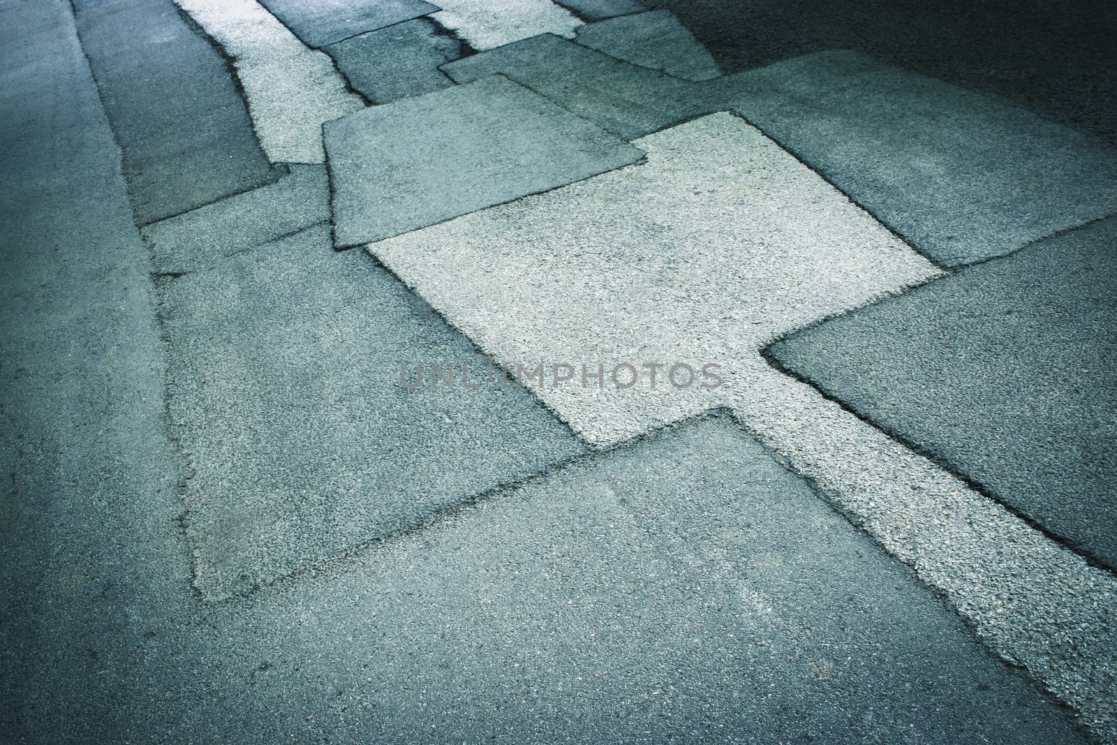 abstract background or texture asphalt road with patches