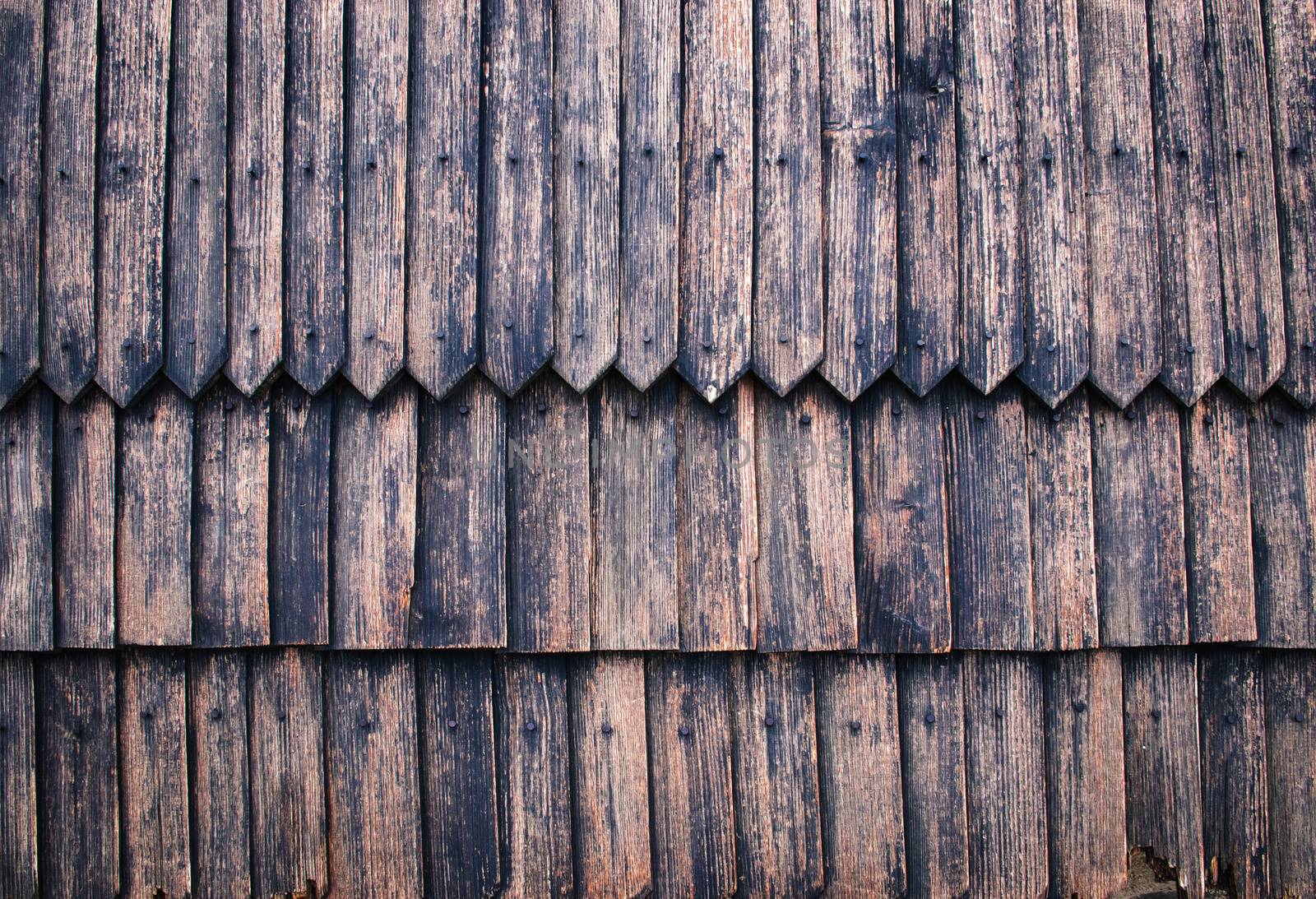 background or texture wall of old wooden shingles