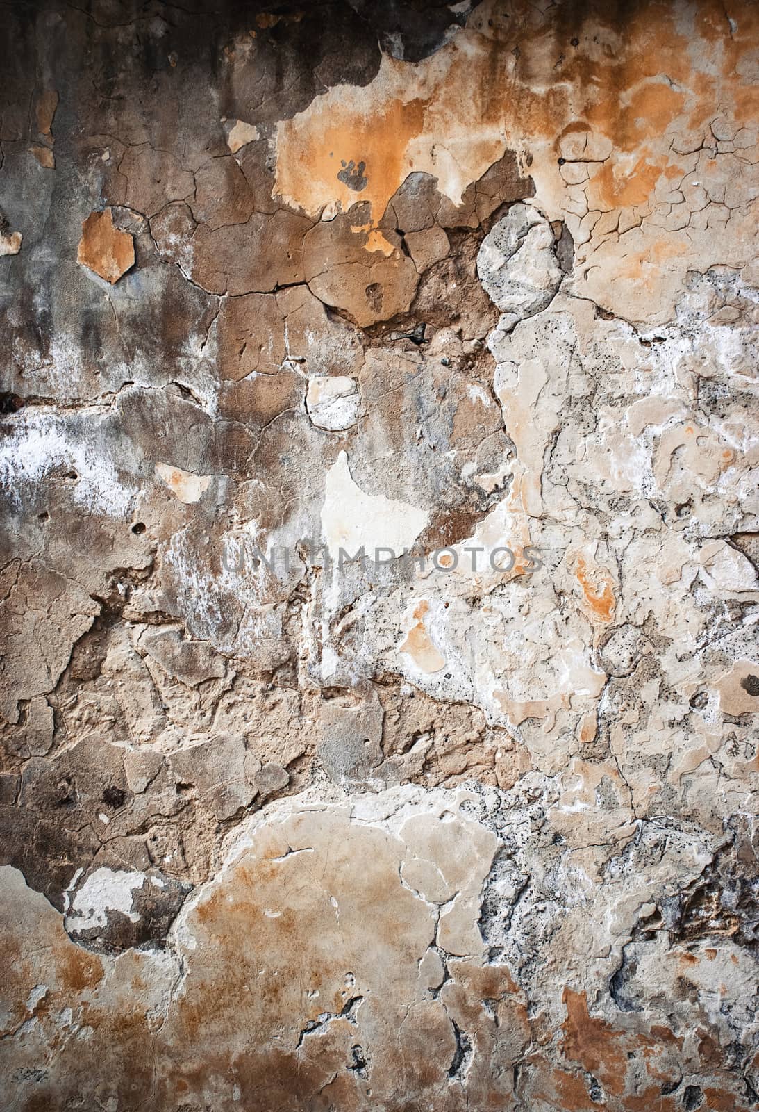 abstract background or texture Detail of an old weathered fallen plaster