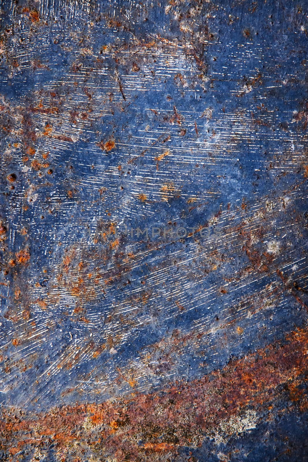 abstract background or texture old blue paint on rusty metal