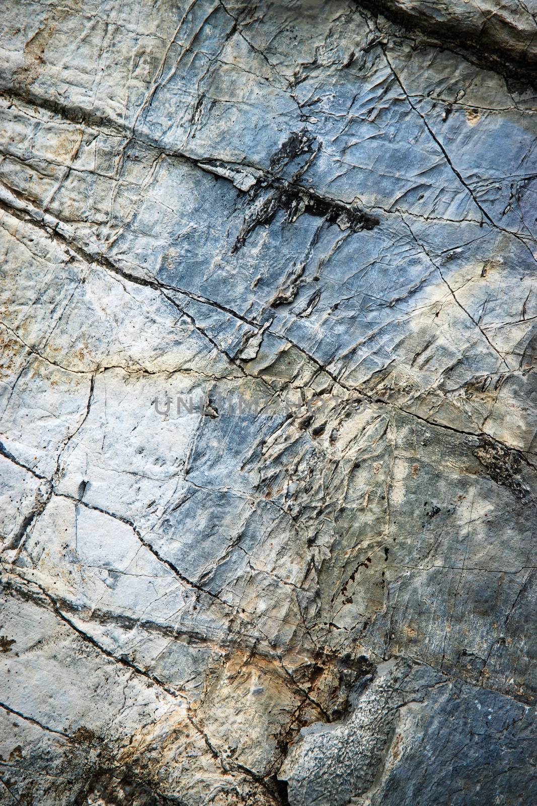 abstract background or texture quartz veins on blue limestone rock