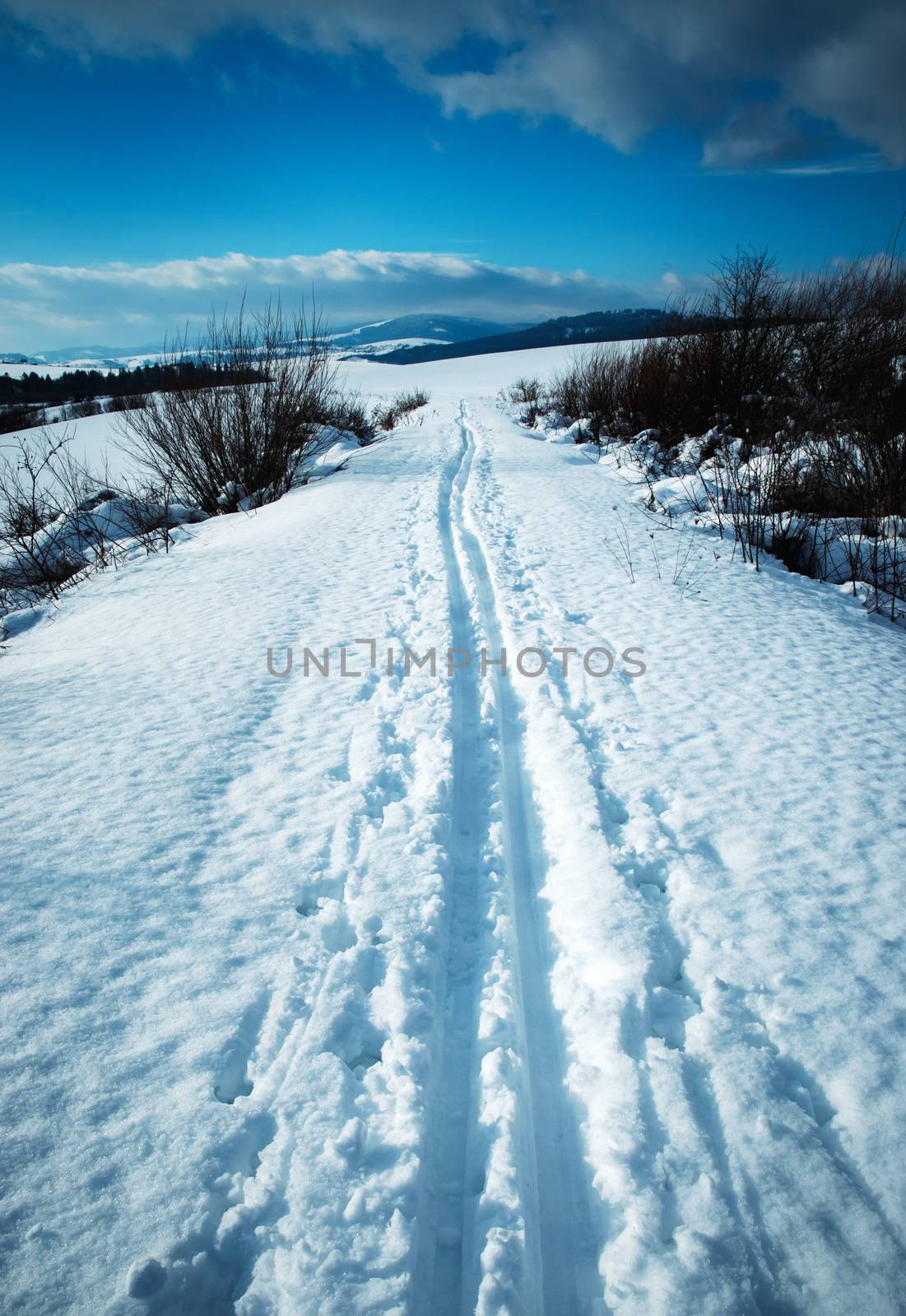 landscape snowy winter landscape with cross country ski path
