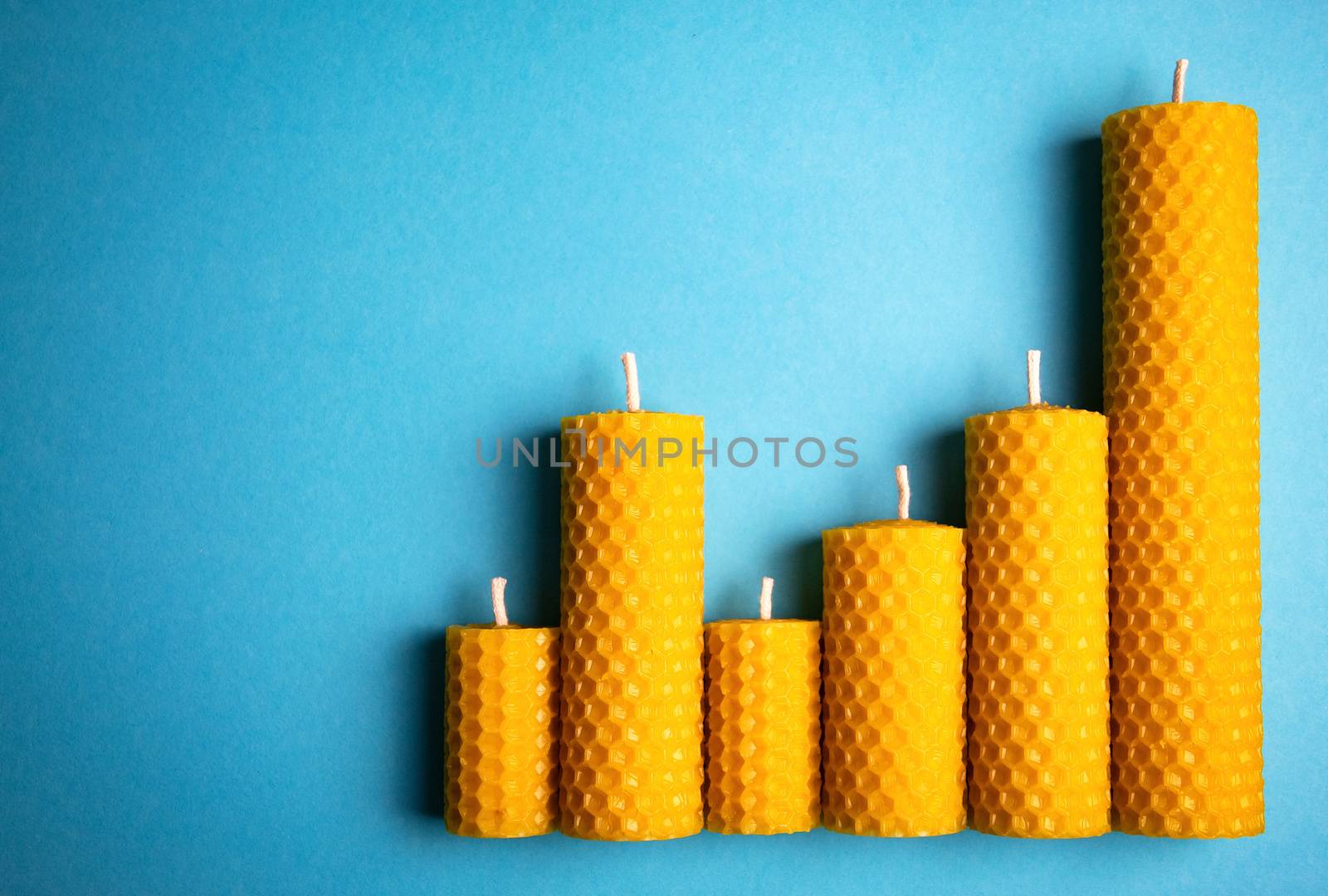 group of candles with wax honeycomb by Ahojdoma