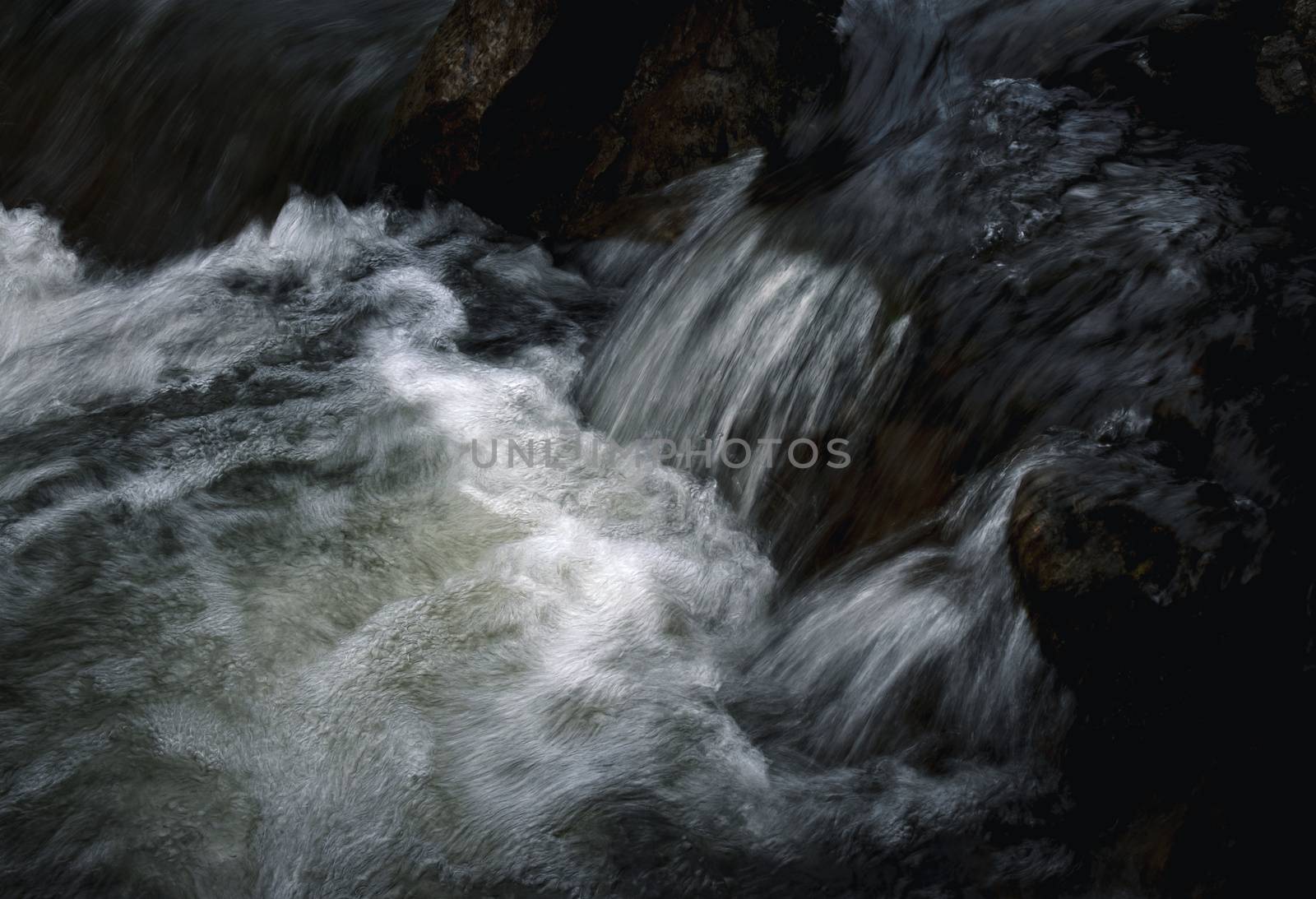 detail ripples dark wild river by Ahojdoma