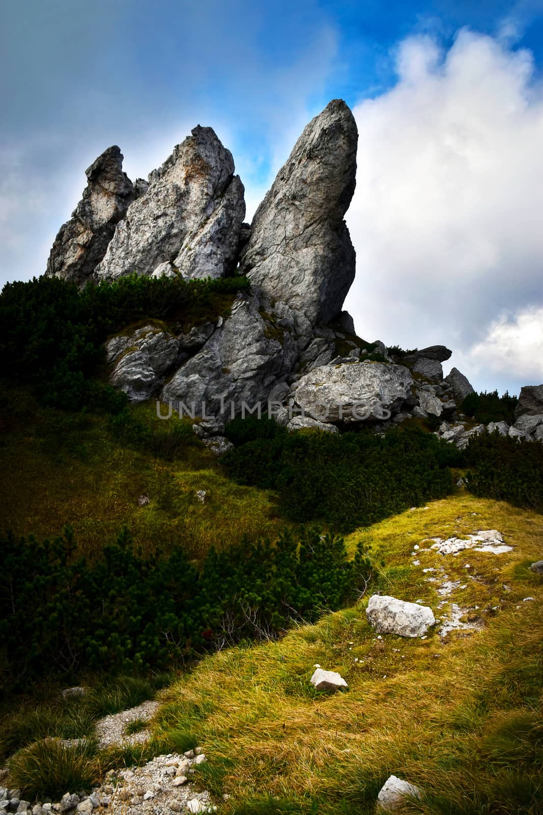 landscape background a triple peak in a limestone rocky town