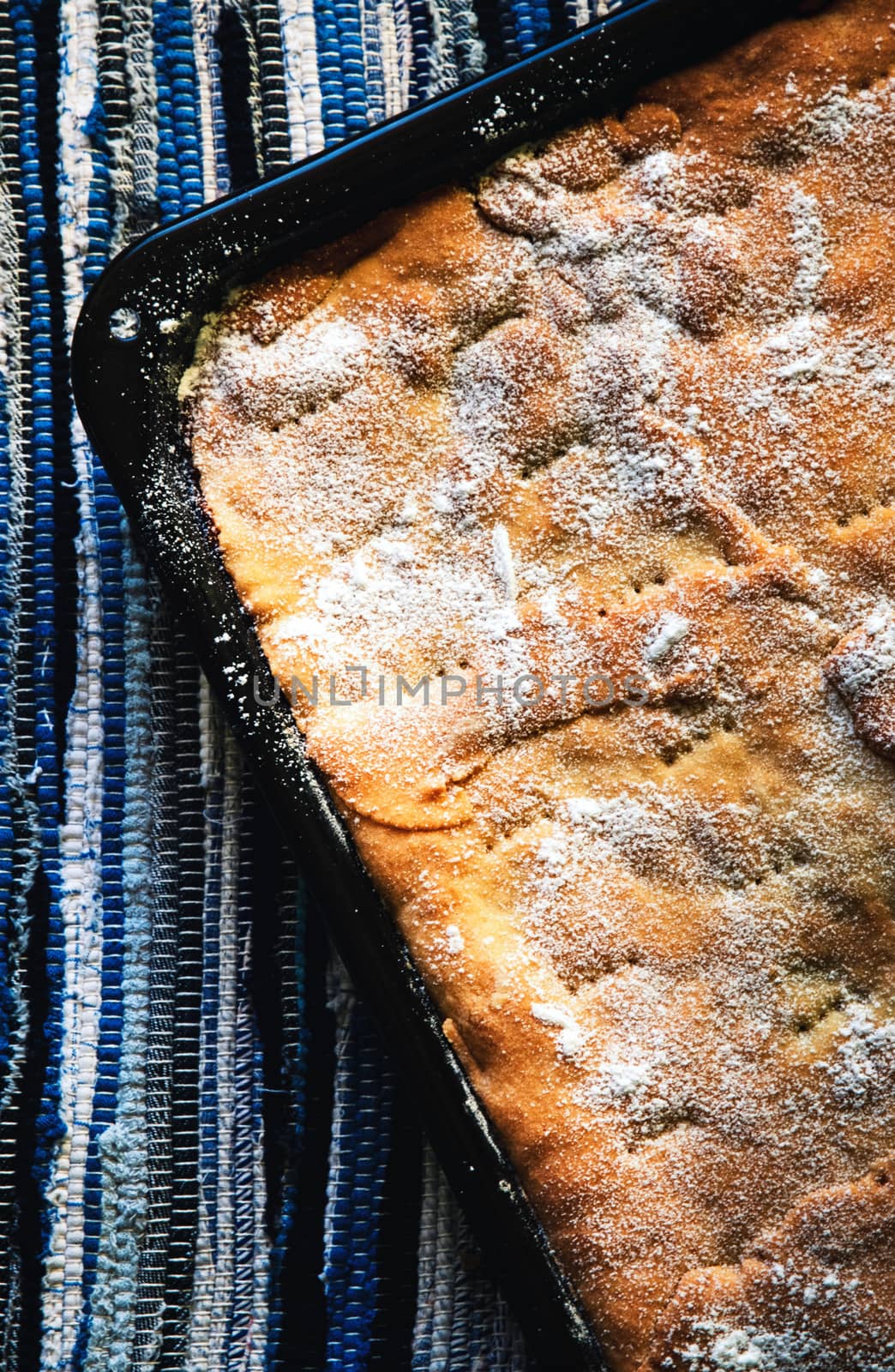 abstract surface of baked cake in a pan by Ahojdoma