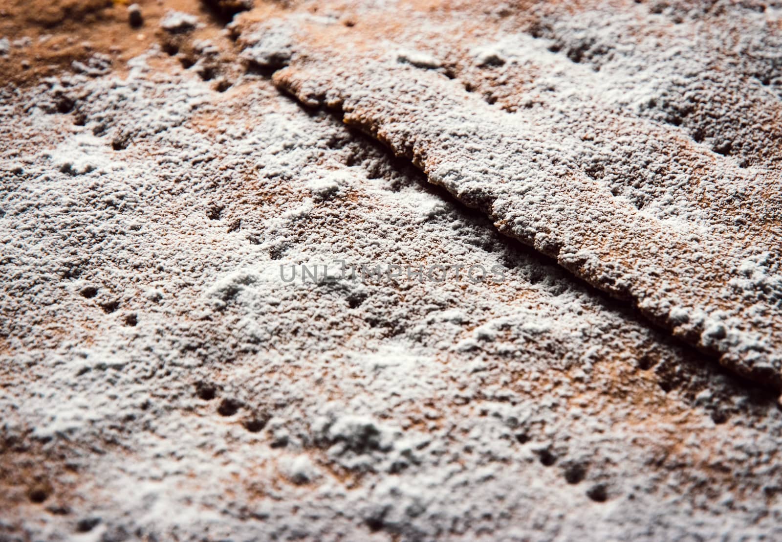 food background or texture the surface of the pie sprinkled with sugar