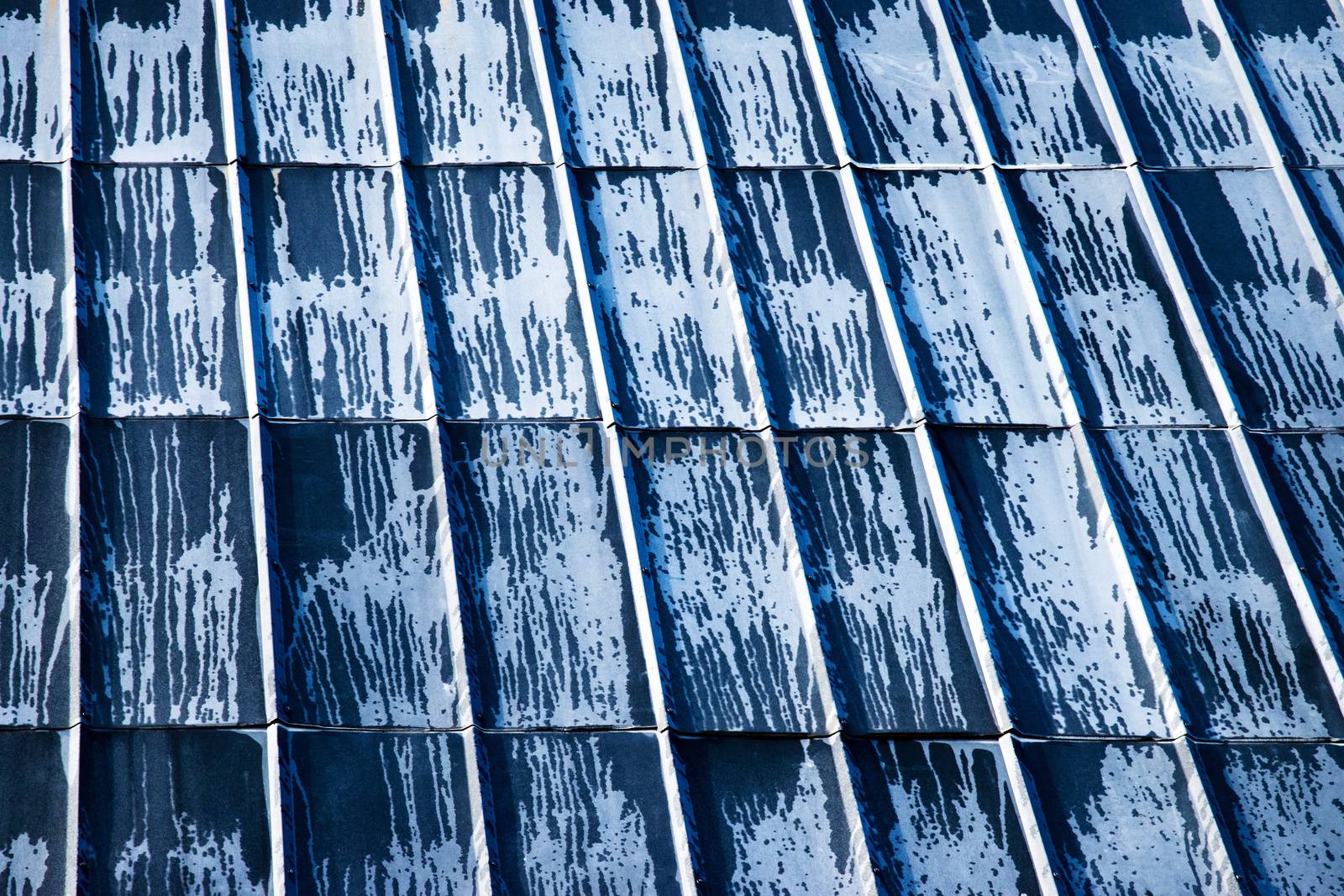 abstract spots on the surface of the metal roof by Ahojdoma