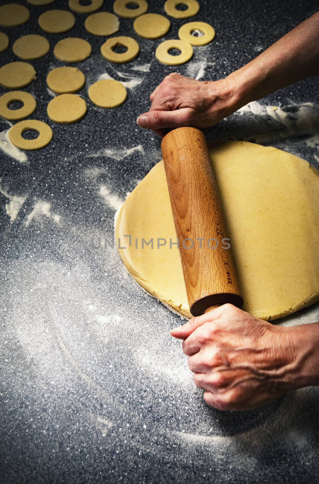 food background Rolls the raw dough on cakes