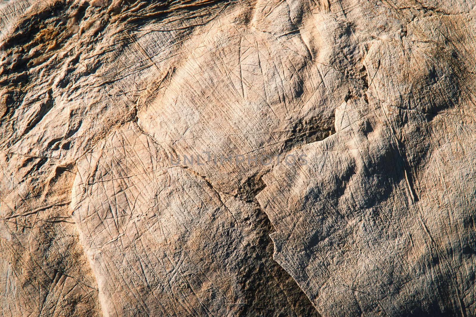 background or texture dark ocher limestone with scratches