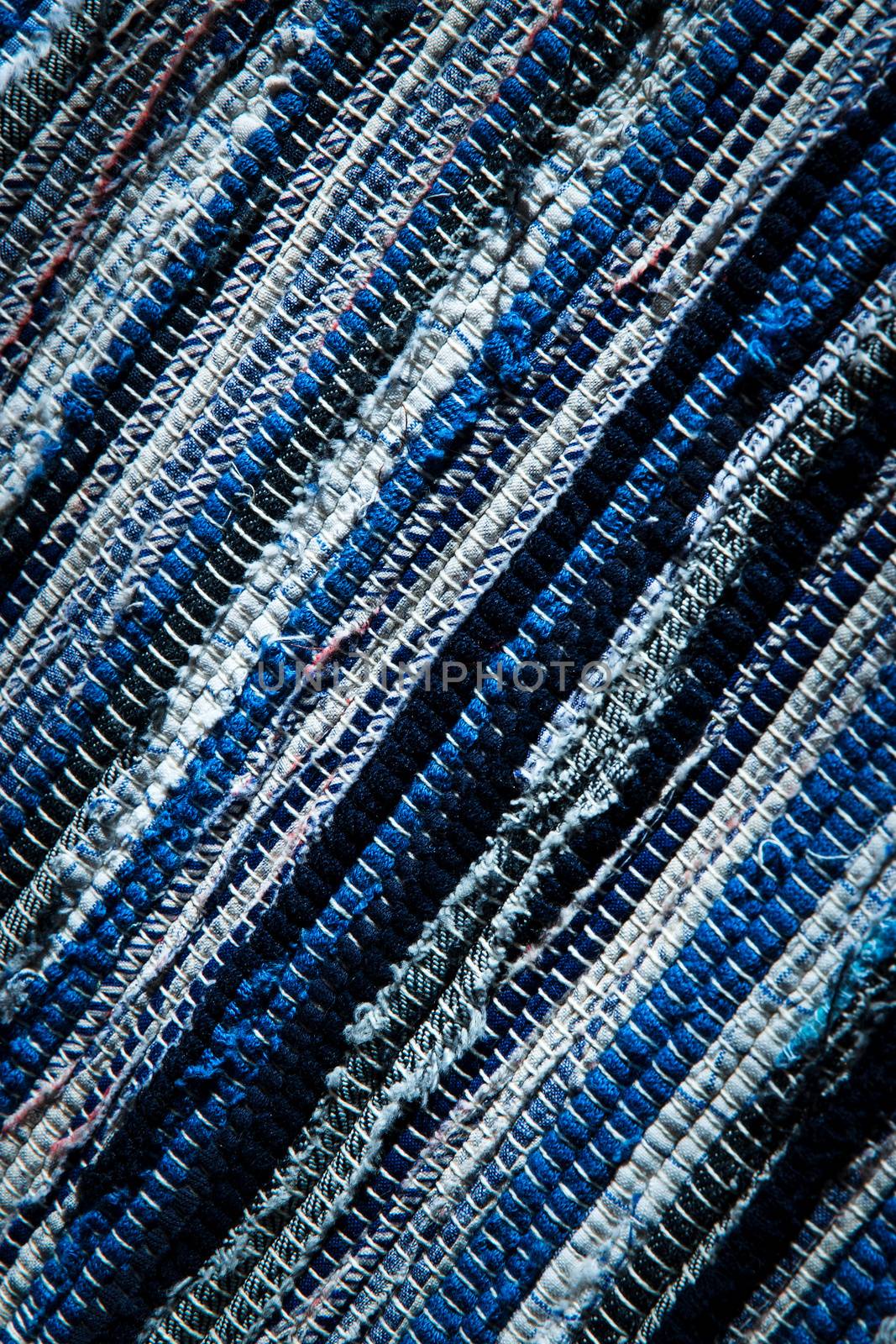 blue and white woven carpet by Ahojdoma