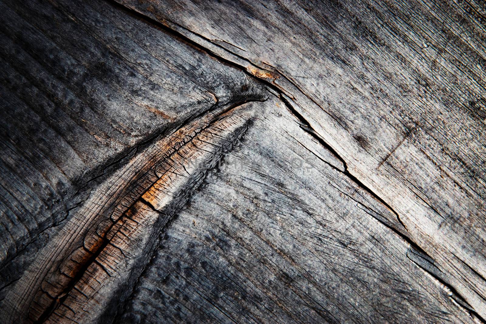 dark detail of a gray wooden board by Ahojdoma