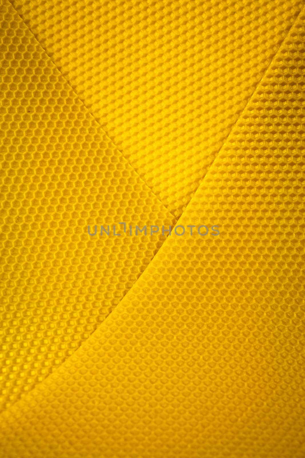 background of yellow wax honeycomb by Ahojdoma