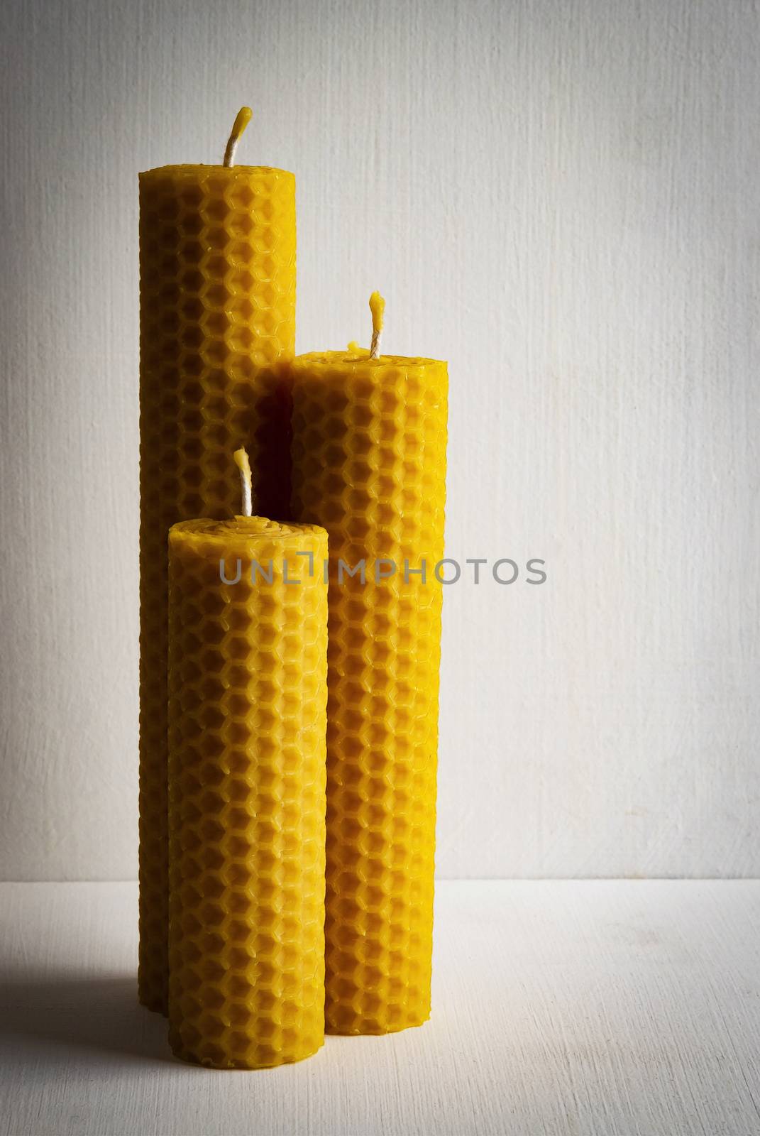 Still life three retro beeswax candles by Ahojdoma