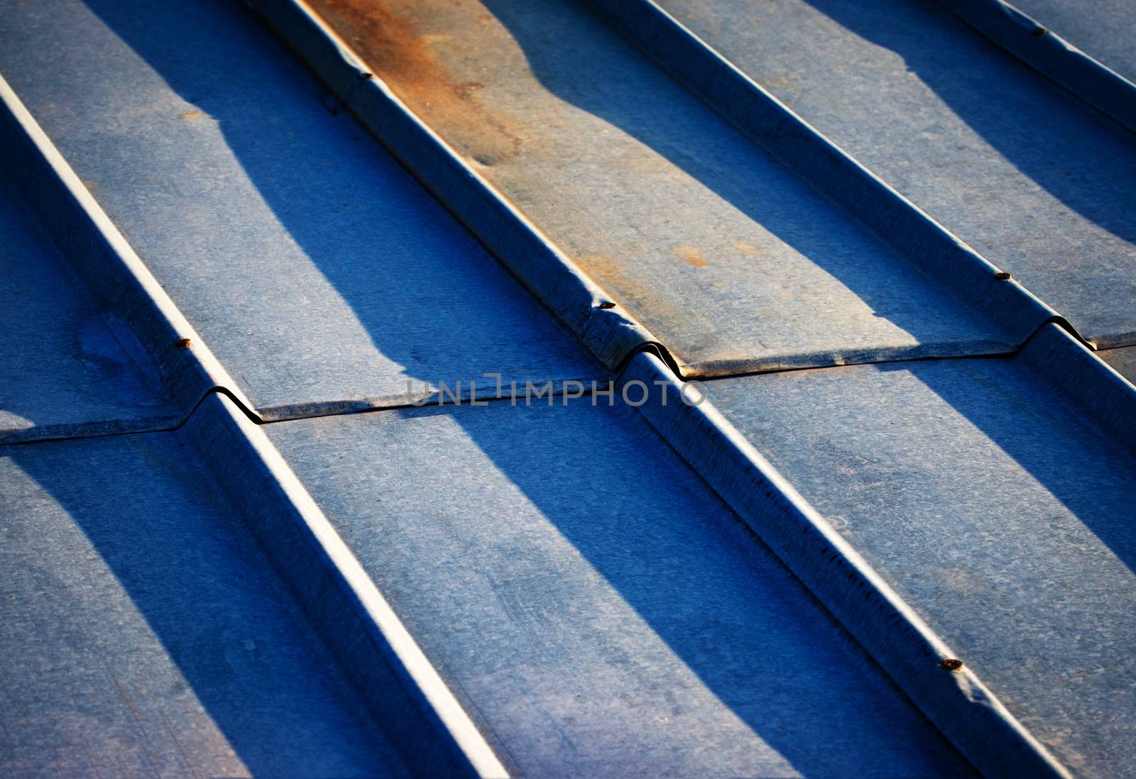 background or texture detail of the old galvanized metal roof