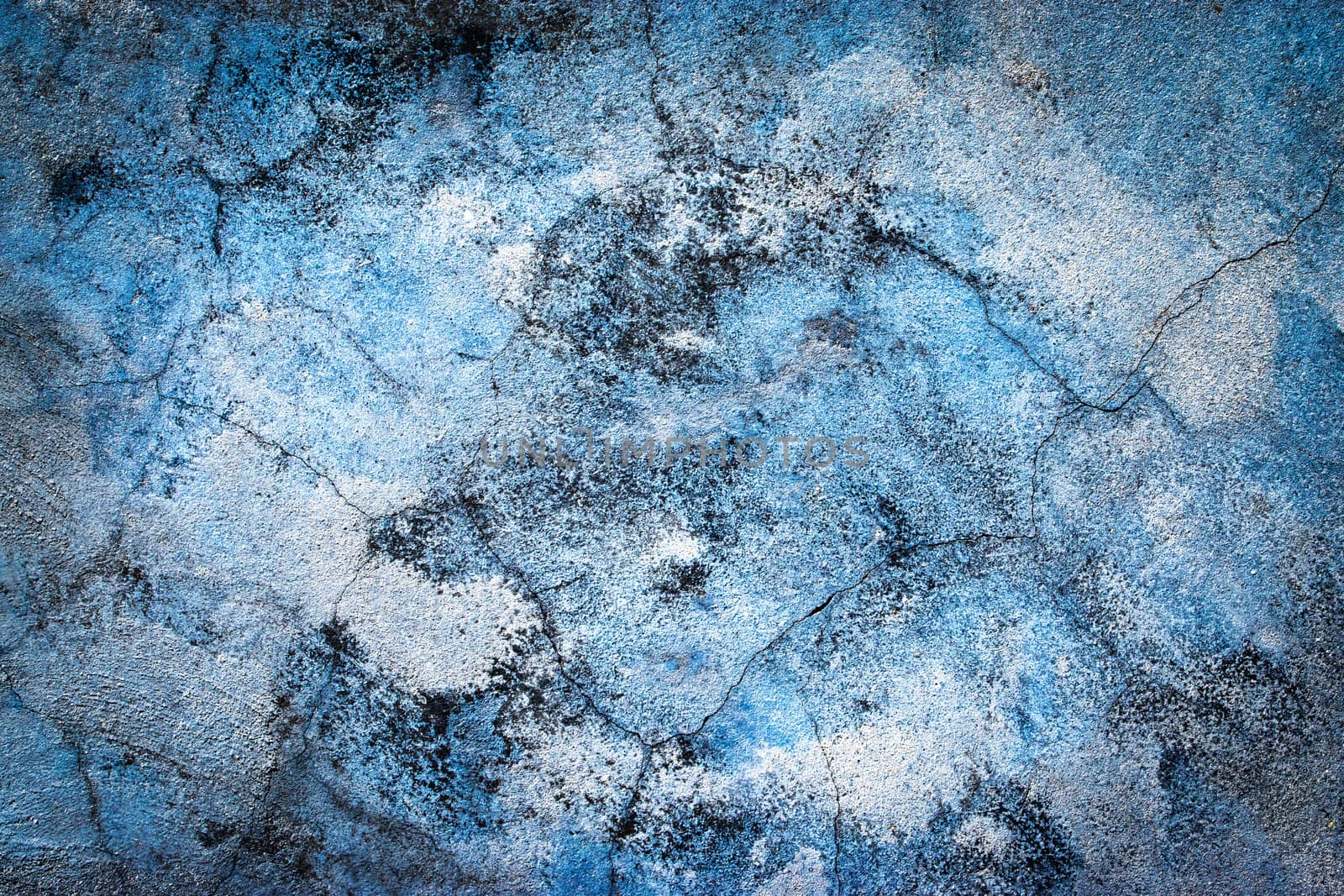 abstract background or texture old blue eroded plaster with mold