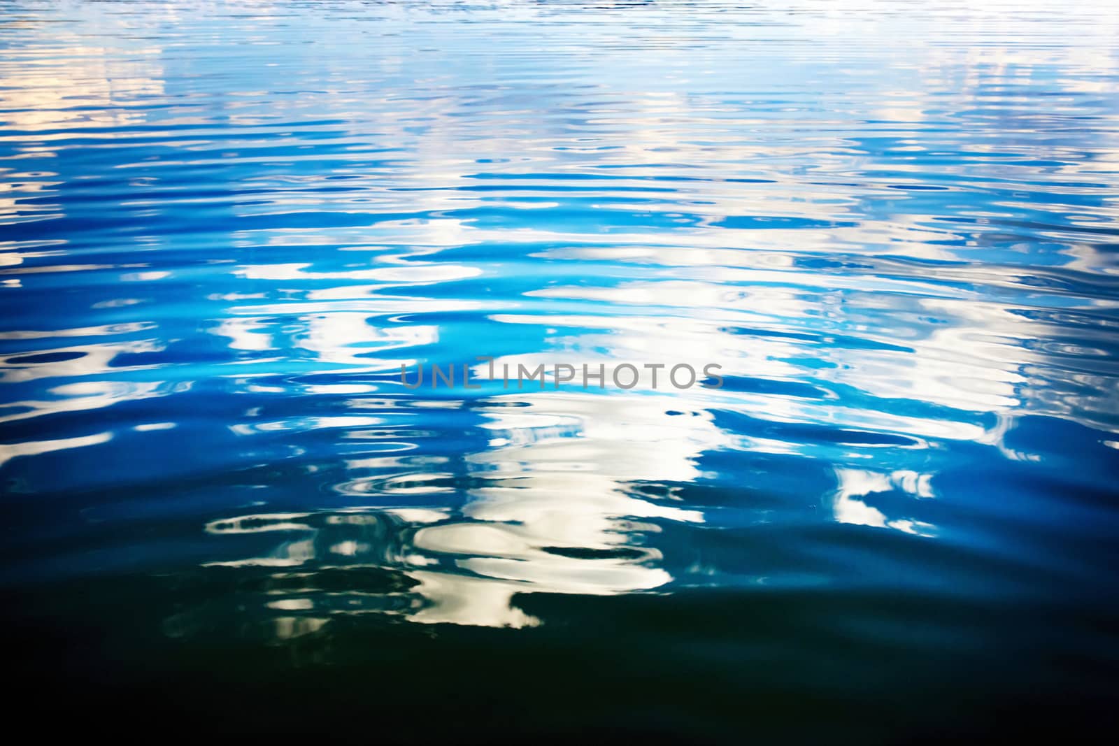 abstract reflection of a cloud on water surface by Ahojdoma