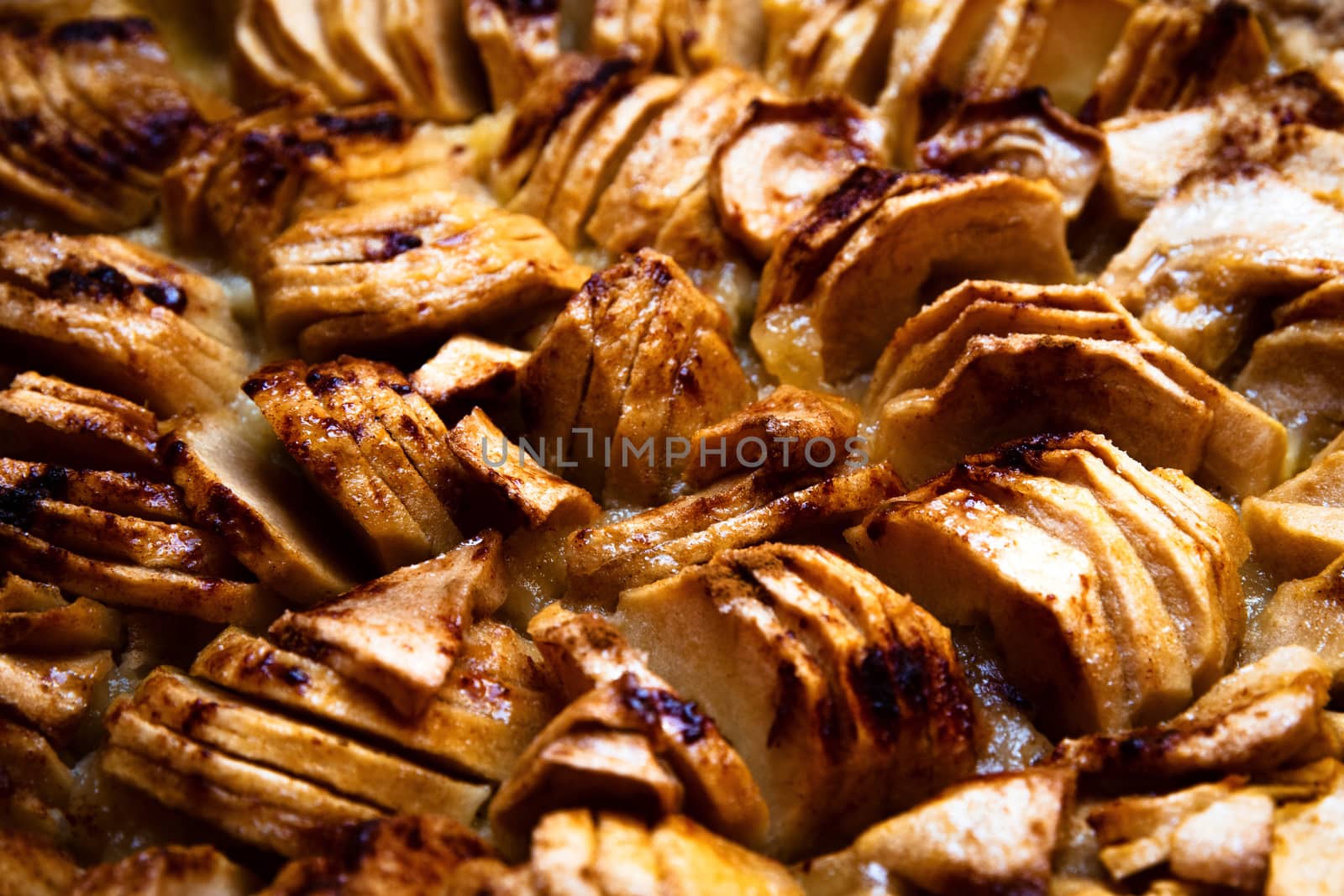 food background apples on the surface of a baked cake